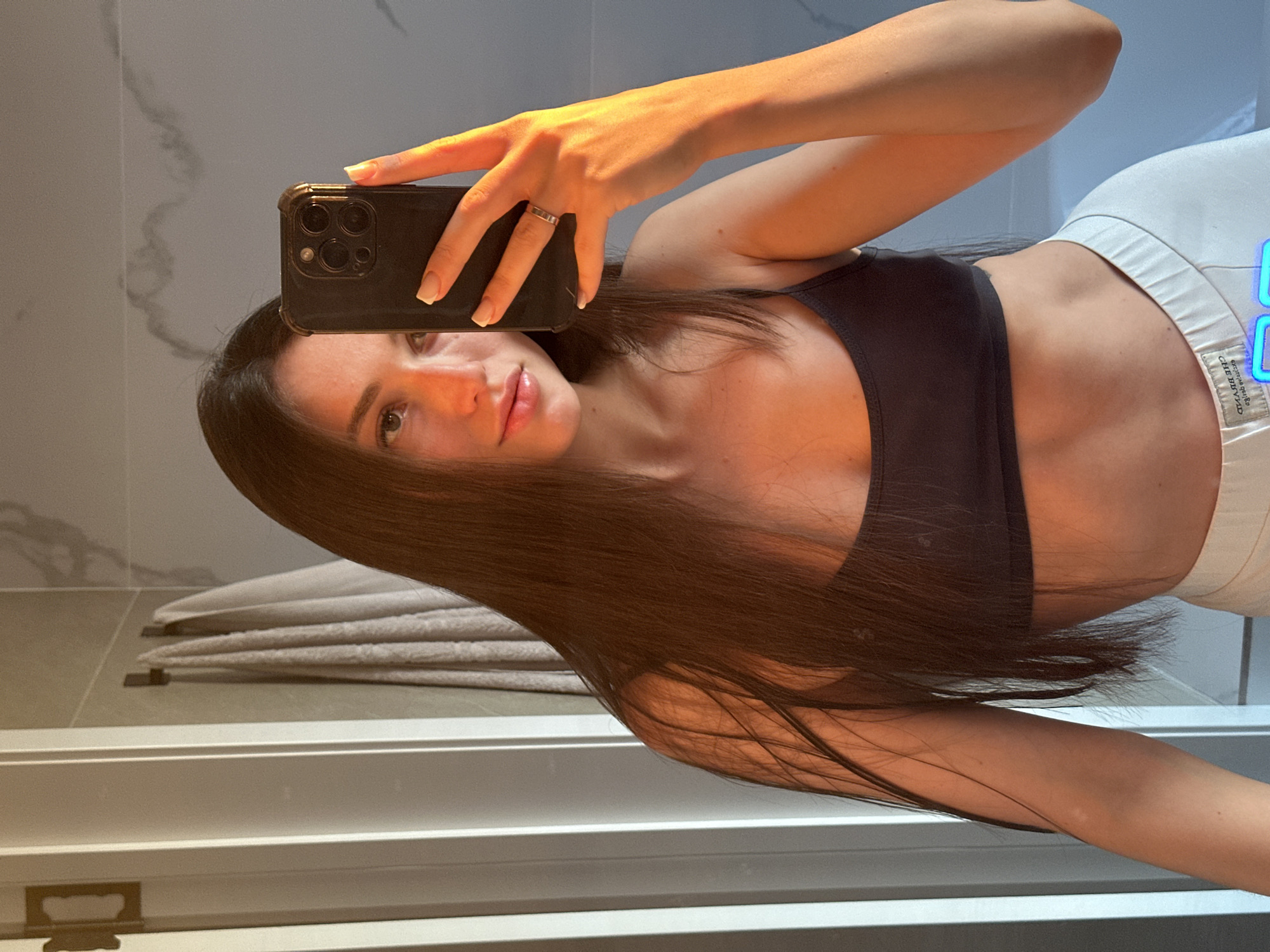 Woman takes bathroom selfie in Эстачи, Russia