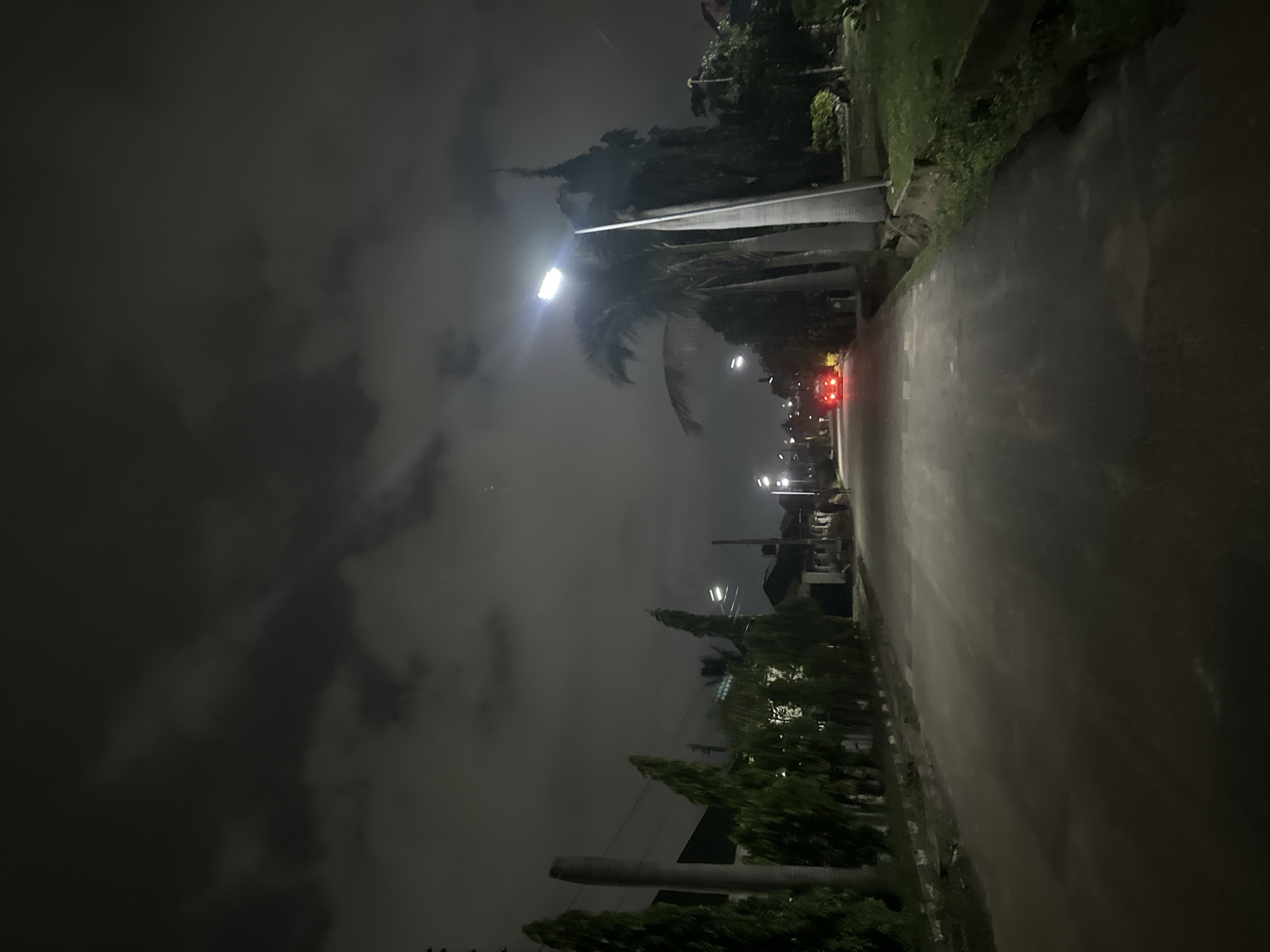 Nighttime residential streets in Abuja, quiet and overcast