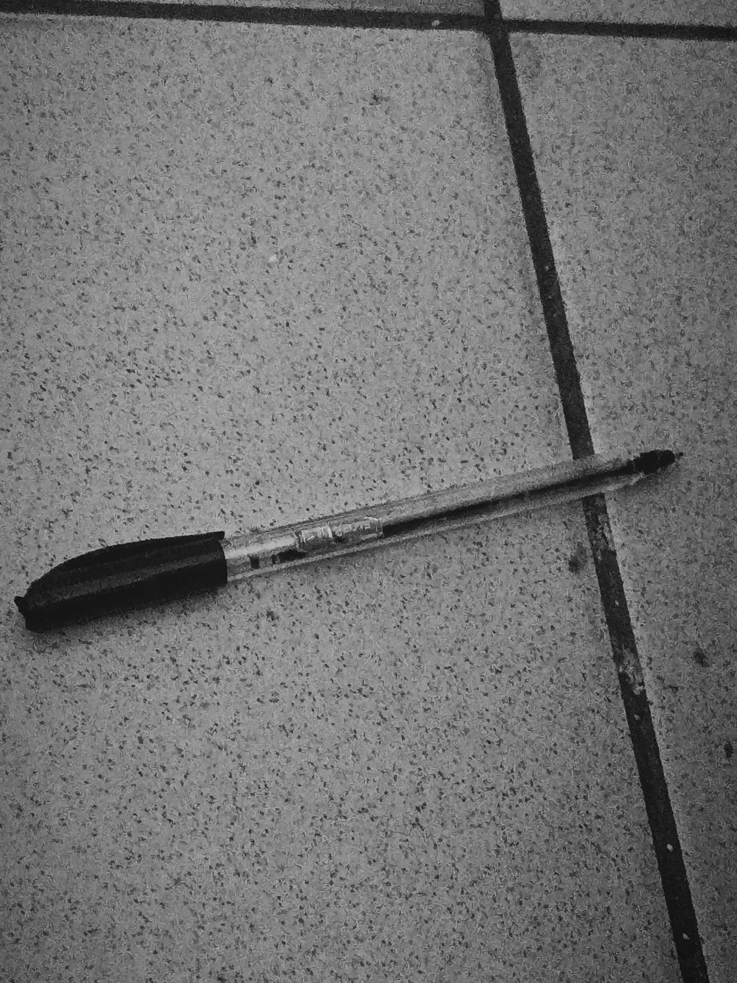 Everyday items and person with notebook observed indoors Nigeria