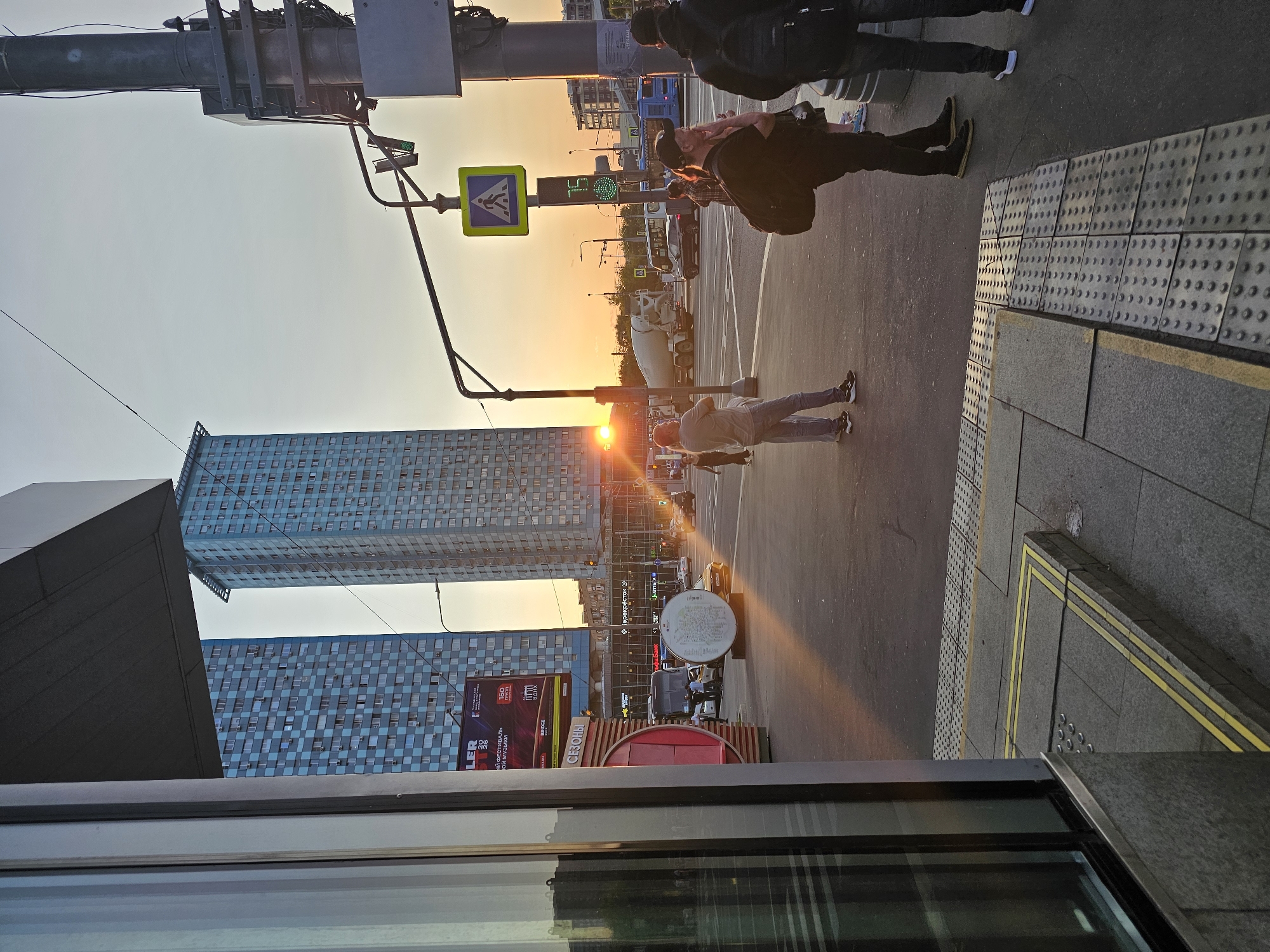 Golden-hour light over Khimki's apartment blocks, late July