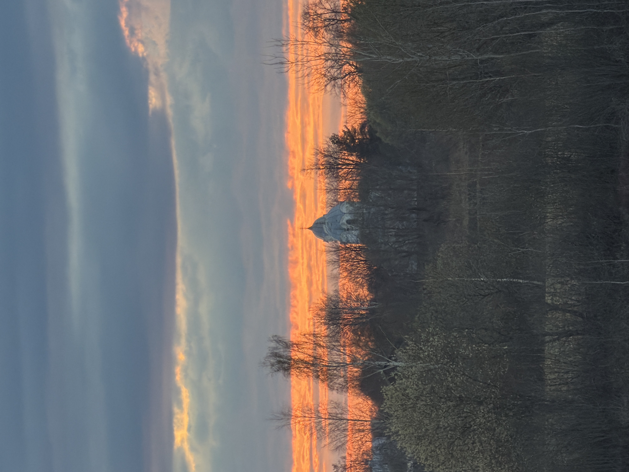 Sunset observed over classical building and water at remote location
