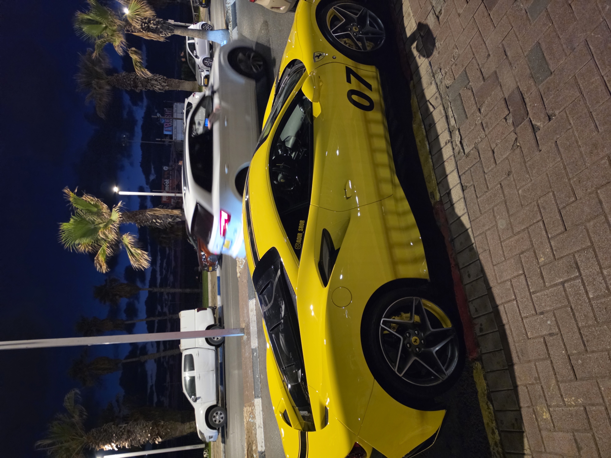 Yellow Ferrari "07" spotted parked on Bat Yam sidewalk