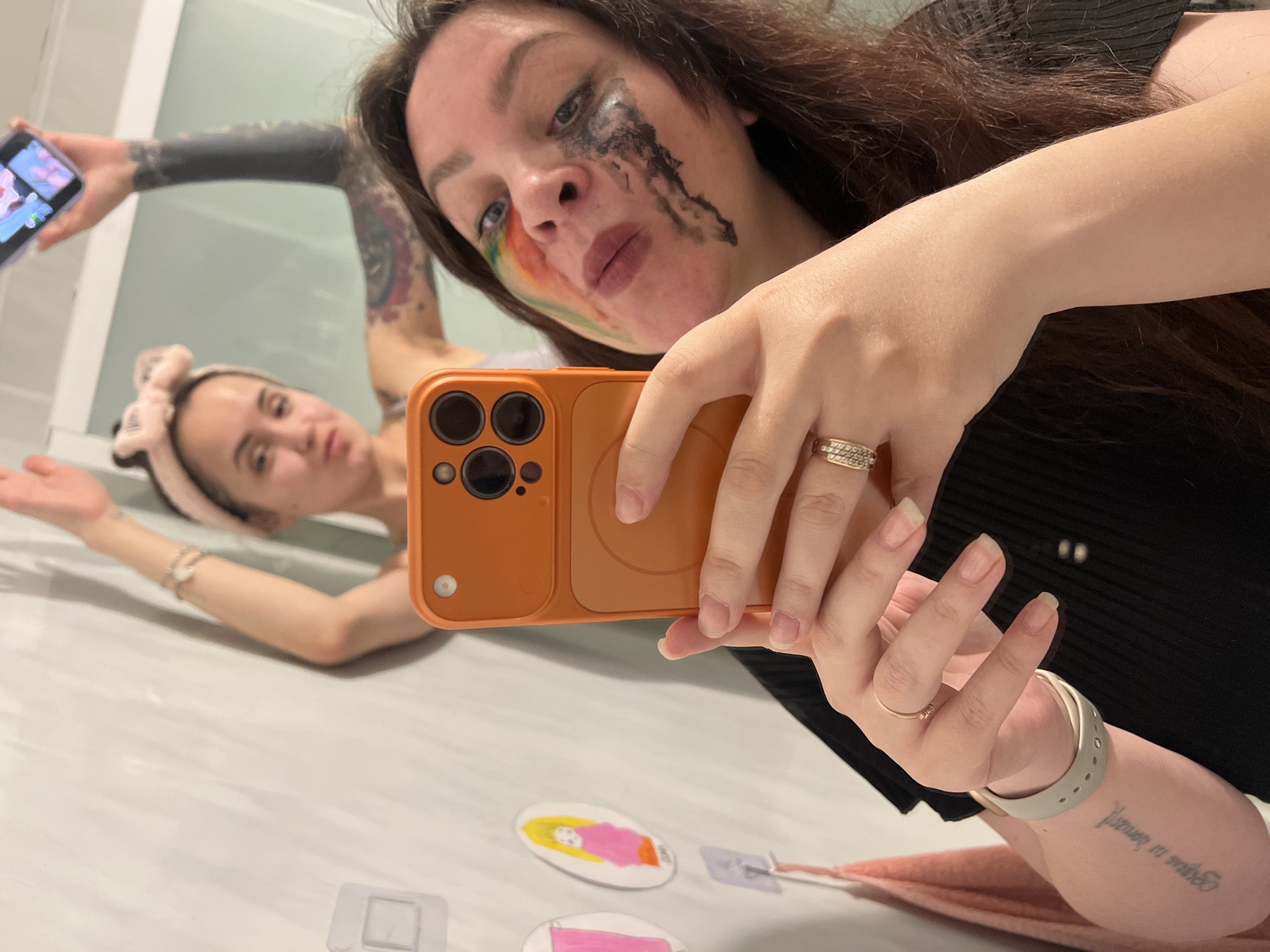 Woman takes selfies with heart stickers in Noviy, Russia