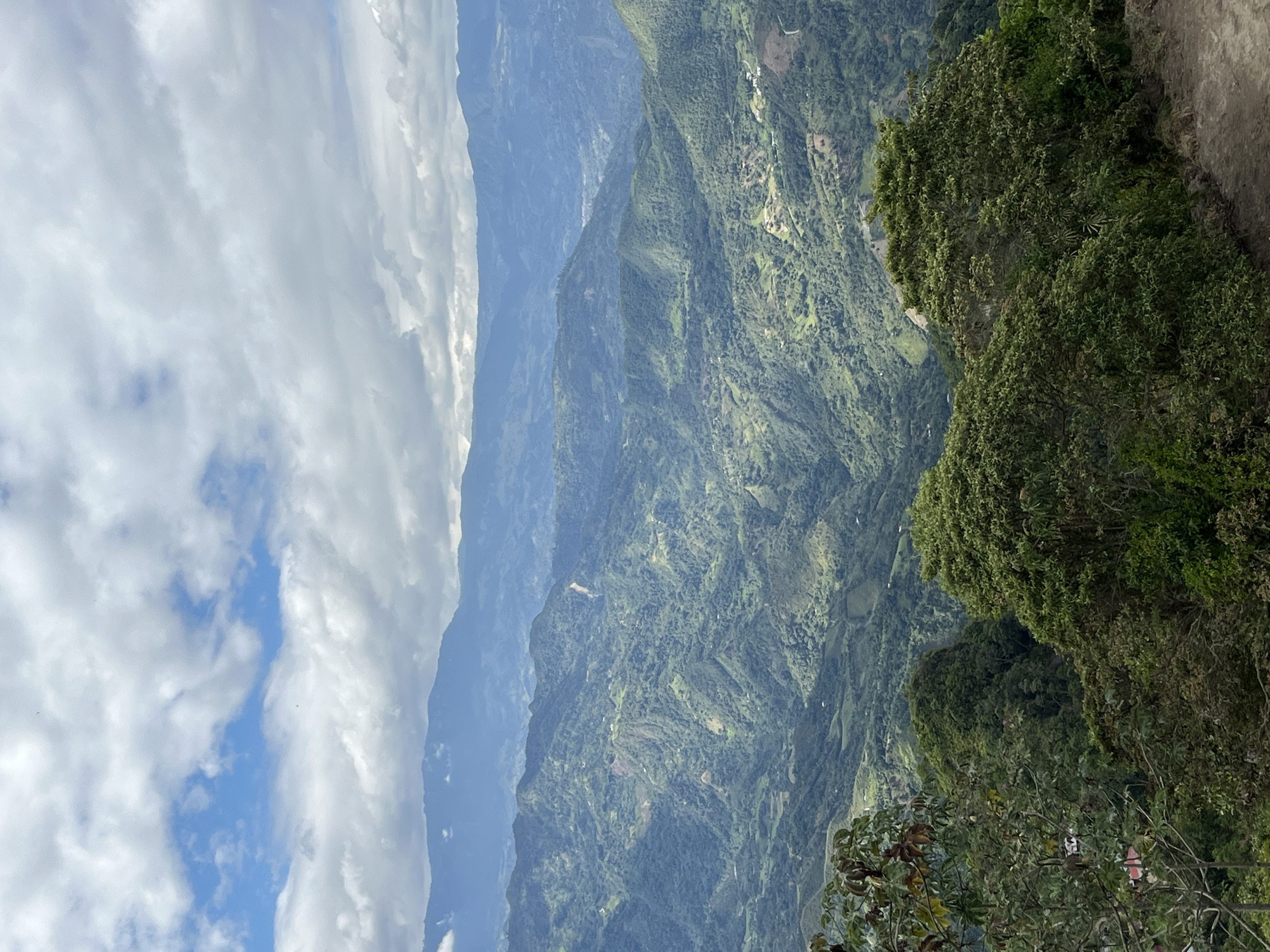Aerial look at Nocaima's layered green hills and mountains