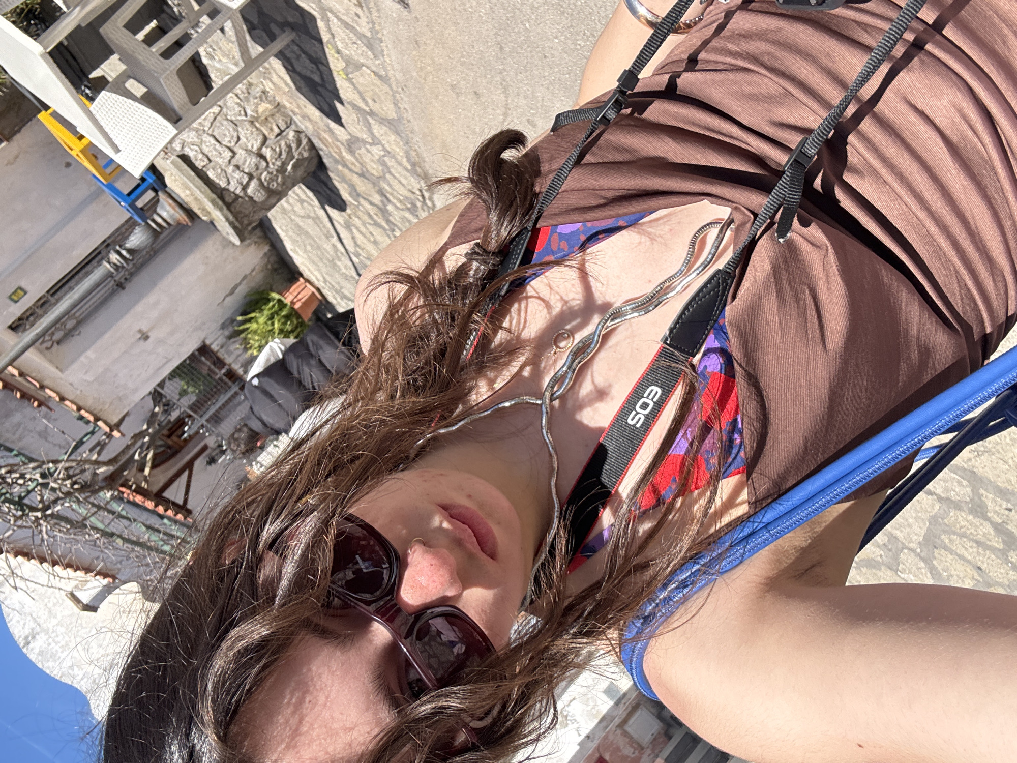 Tourist captures selfies with camera, ticket in Anacapri