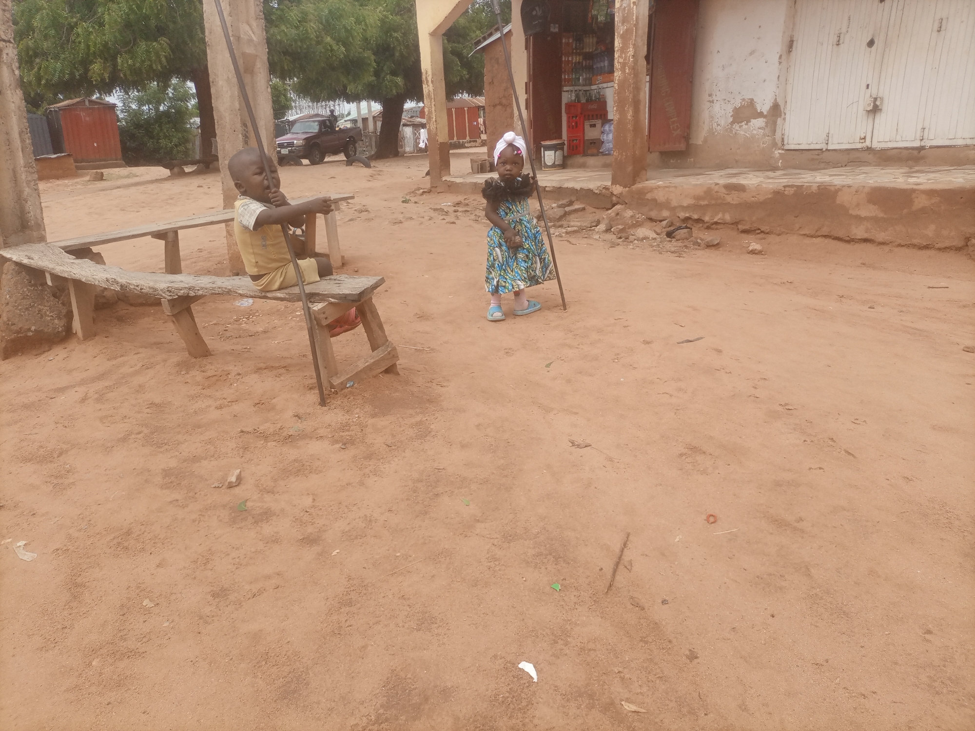 Morning street life across two small Nigerian towns