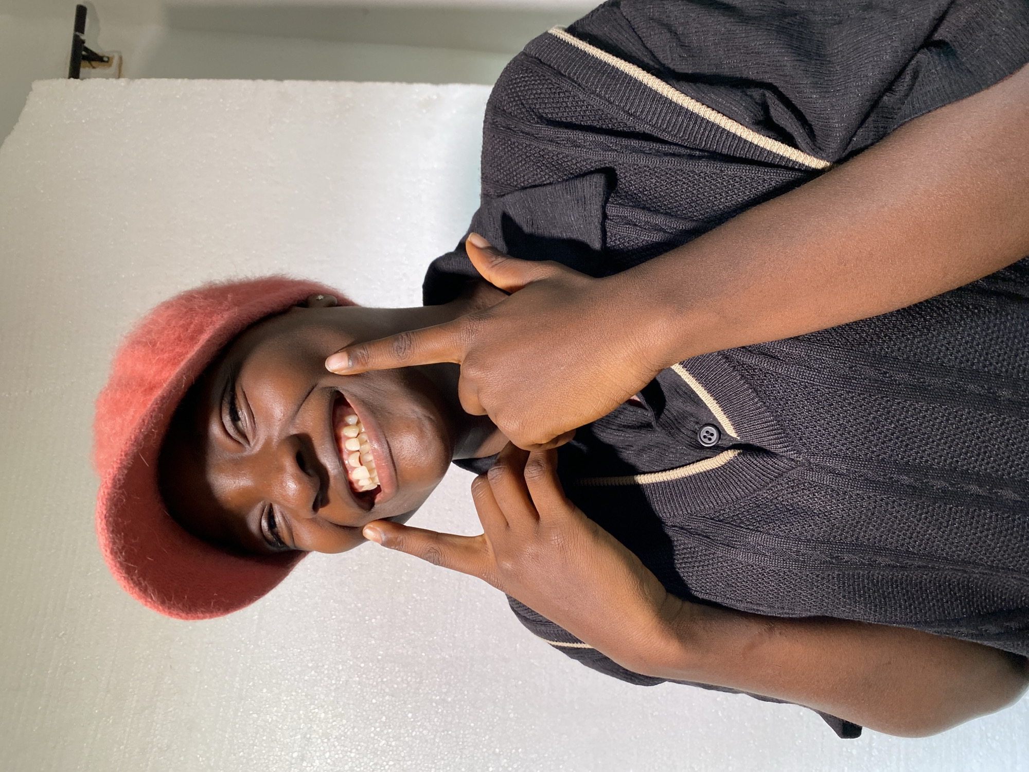Studio shoot in Jos with consistent outfits, poses, and dancing