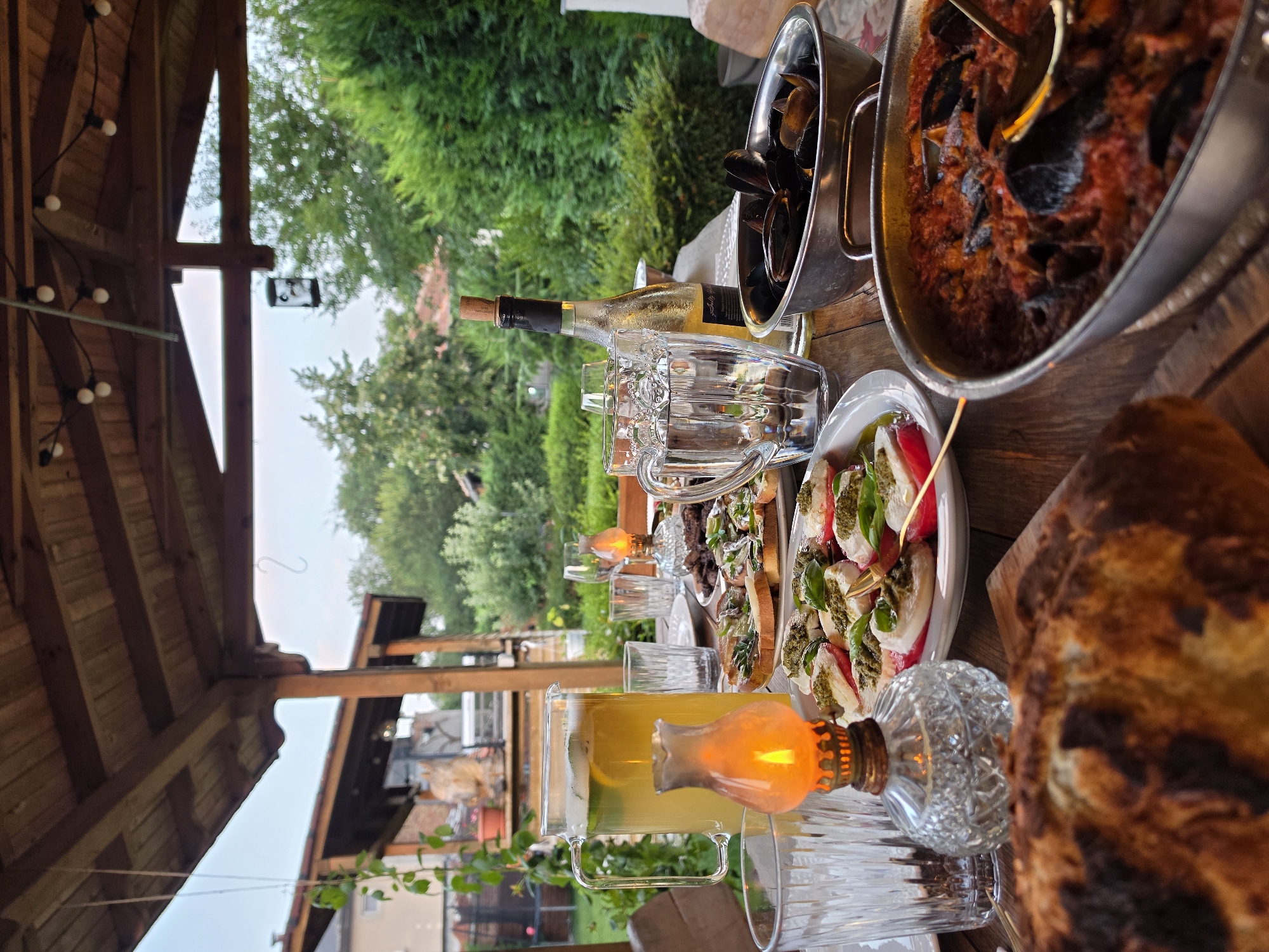 Patio dining with a citrus-mint pitcher in rural Bulgaria