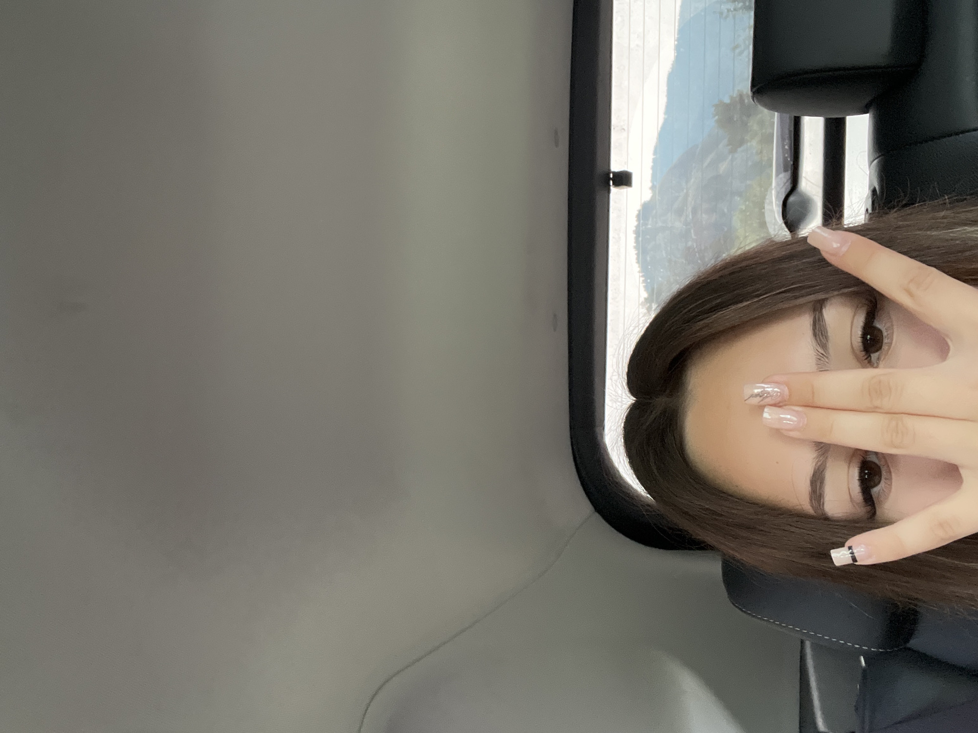 Scenic mountain road trip with classic backseat hang vibes