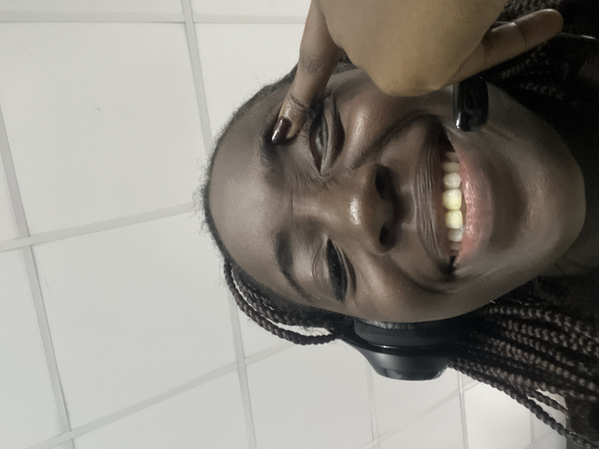 Person captured smiling in candid moment in Karum, Nigeria