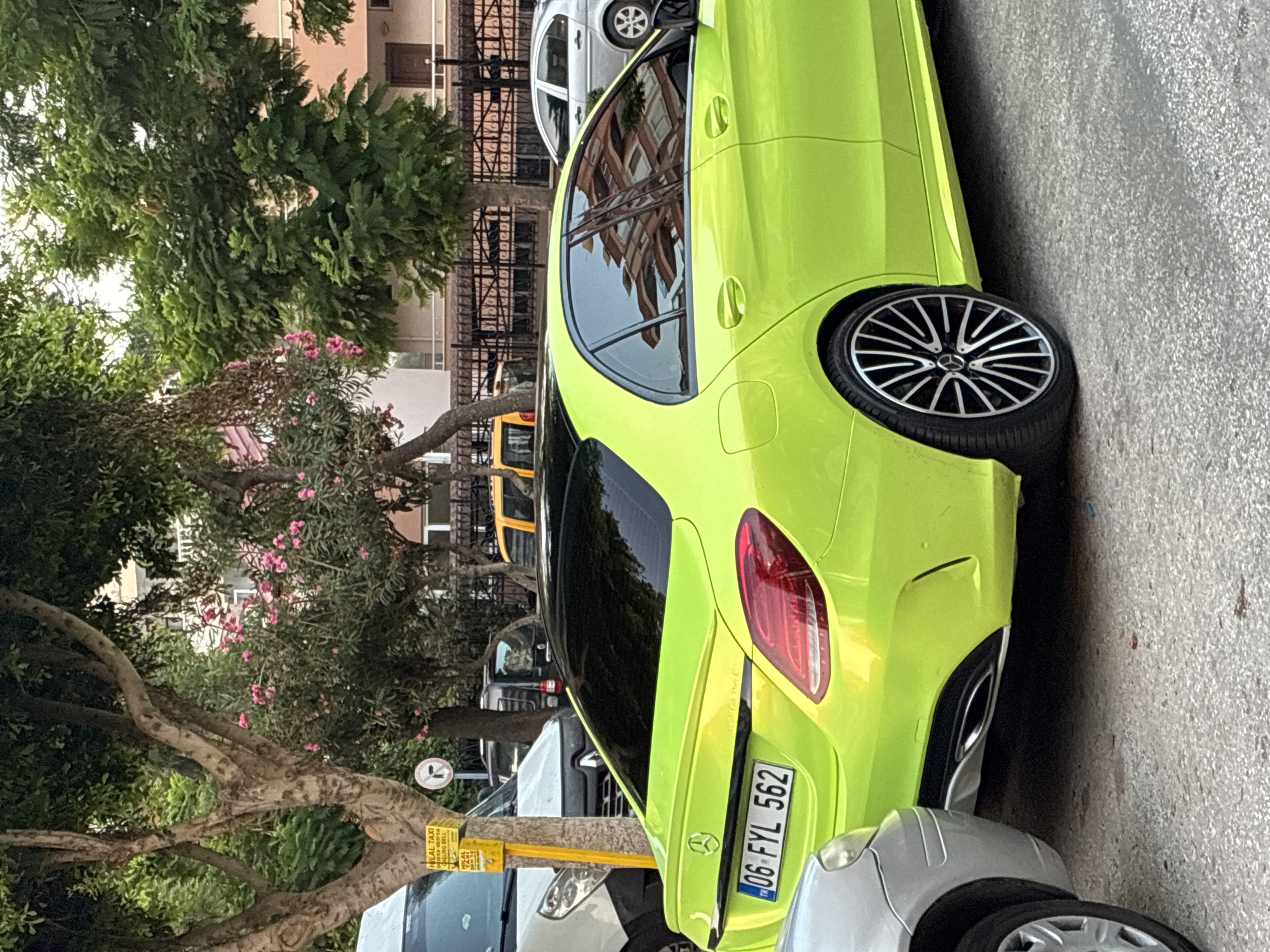 Lime green Mercedes parked on an Alanya street