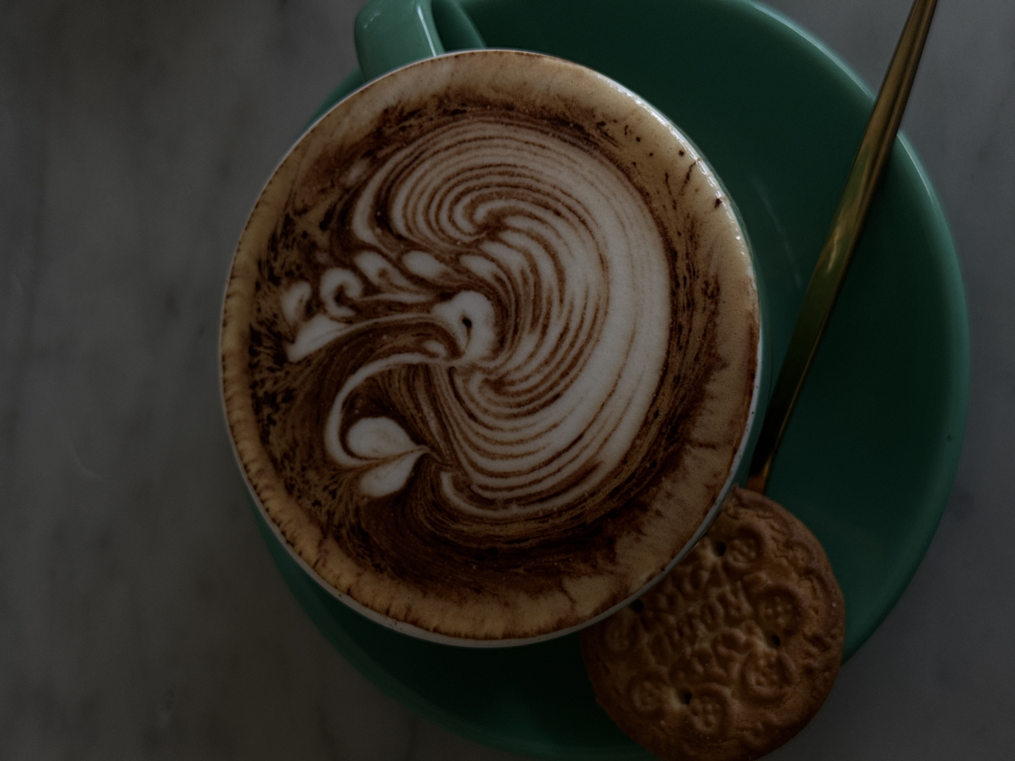 Artistic latte photographed in North Kuta coffee shop