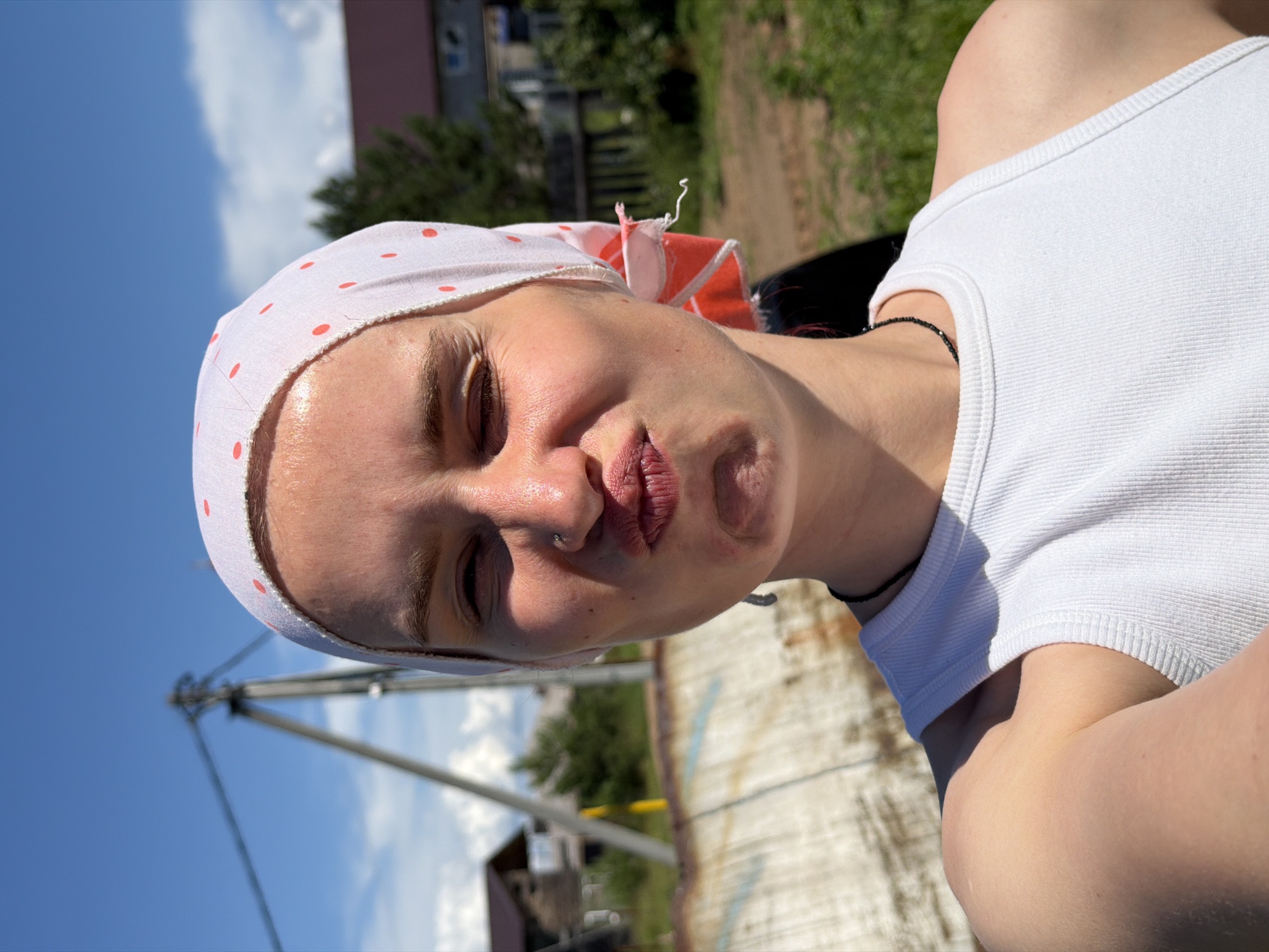 Sunny selfie in Chaikovsky under a clear blue sky.