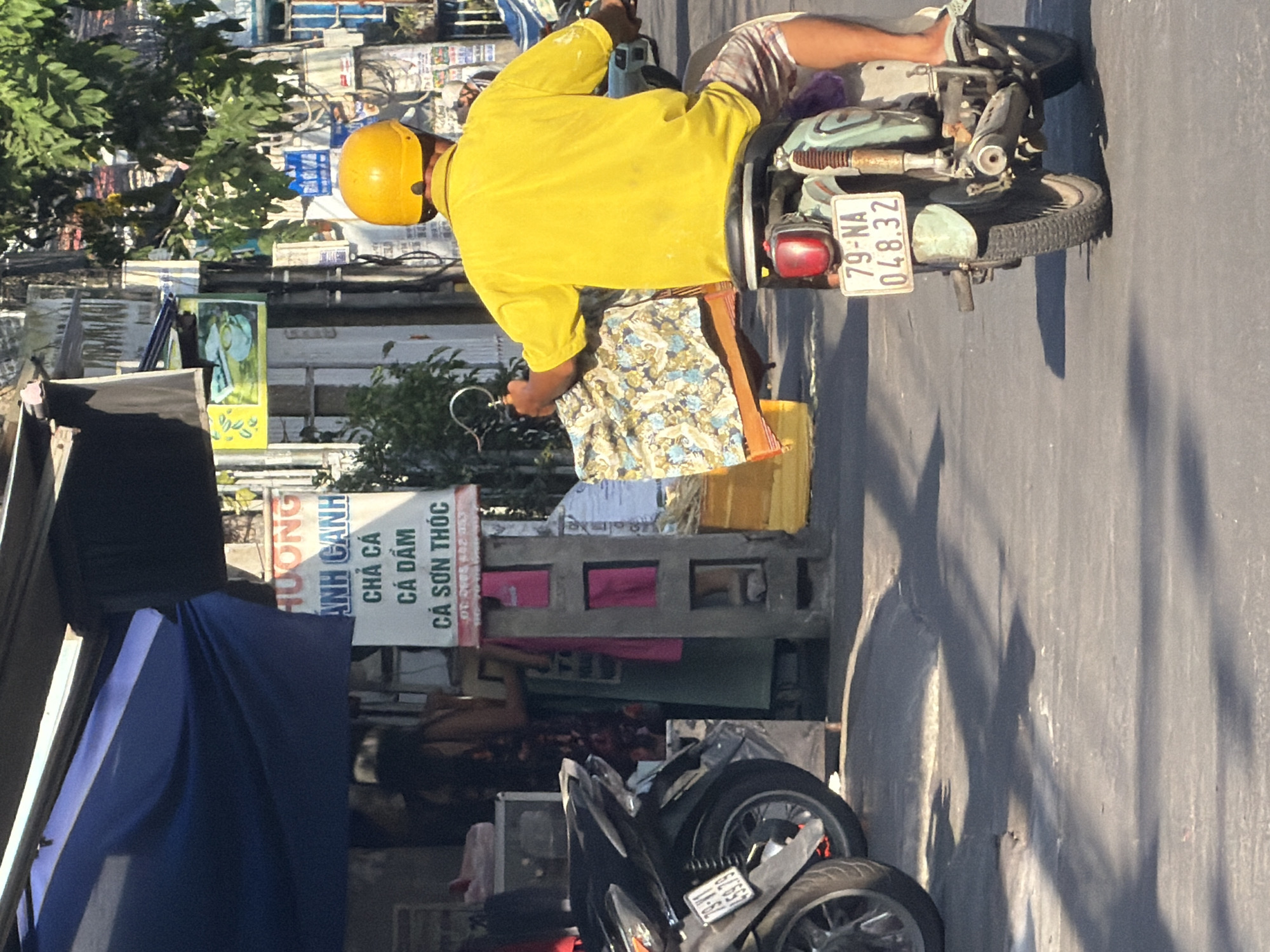 Morning street life across a Nha Trang neighborhood