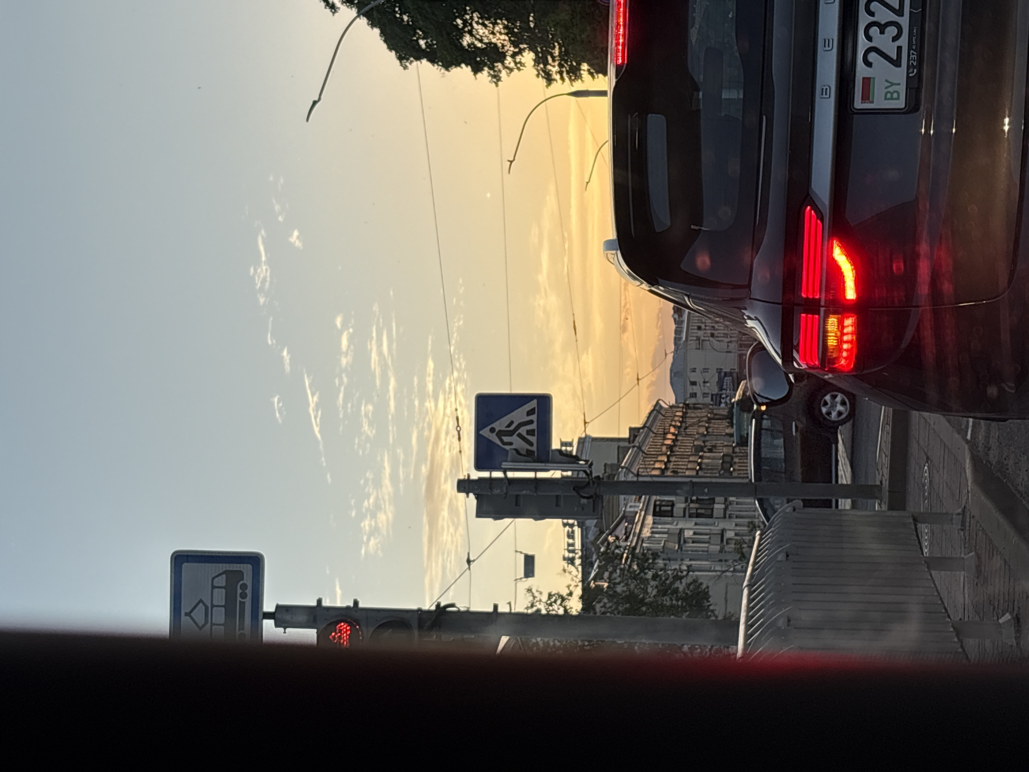 Evening rush hour traffic documented at Minsk intersection