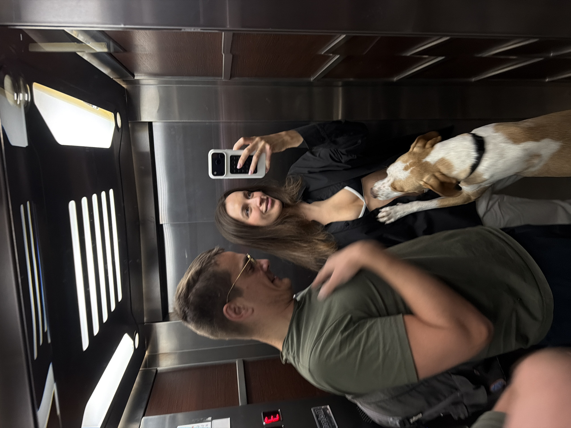 Couple takes elevator selfie with dog in Budva