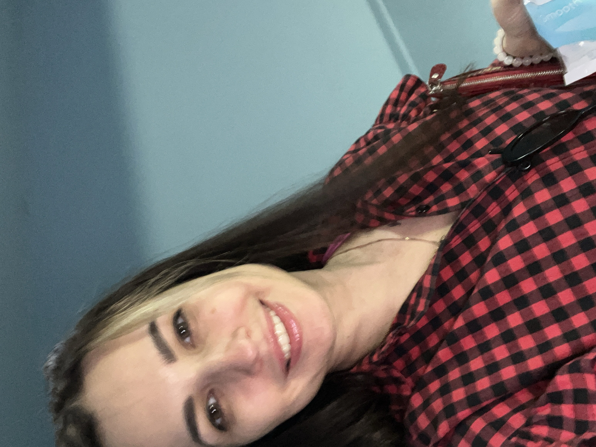 Woman documents car journey with dog through selfies