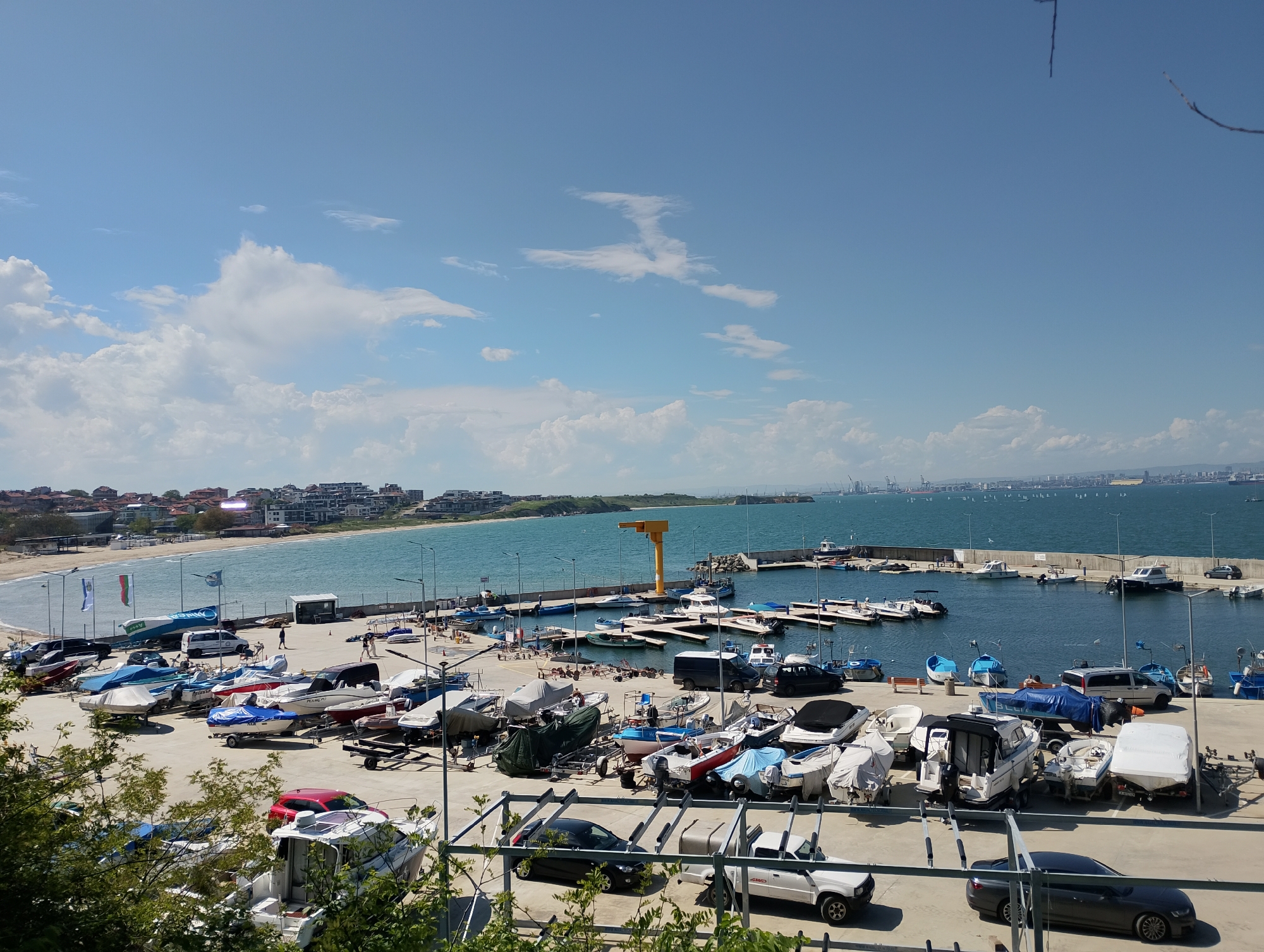 Sunny day documented at Burgas marina with boats and clear skies