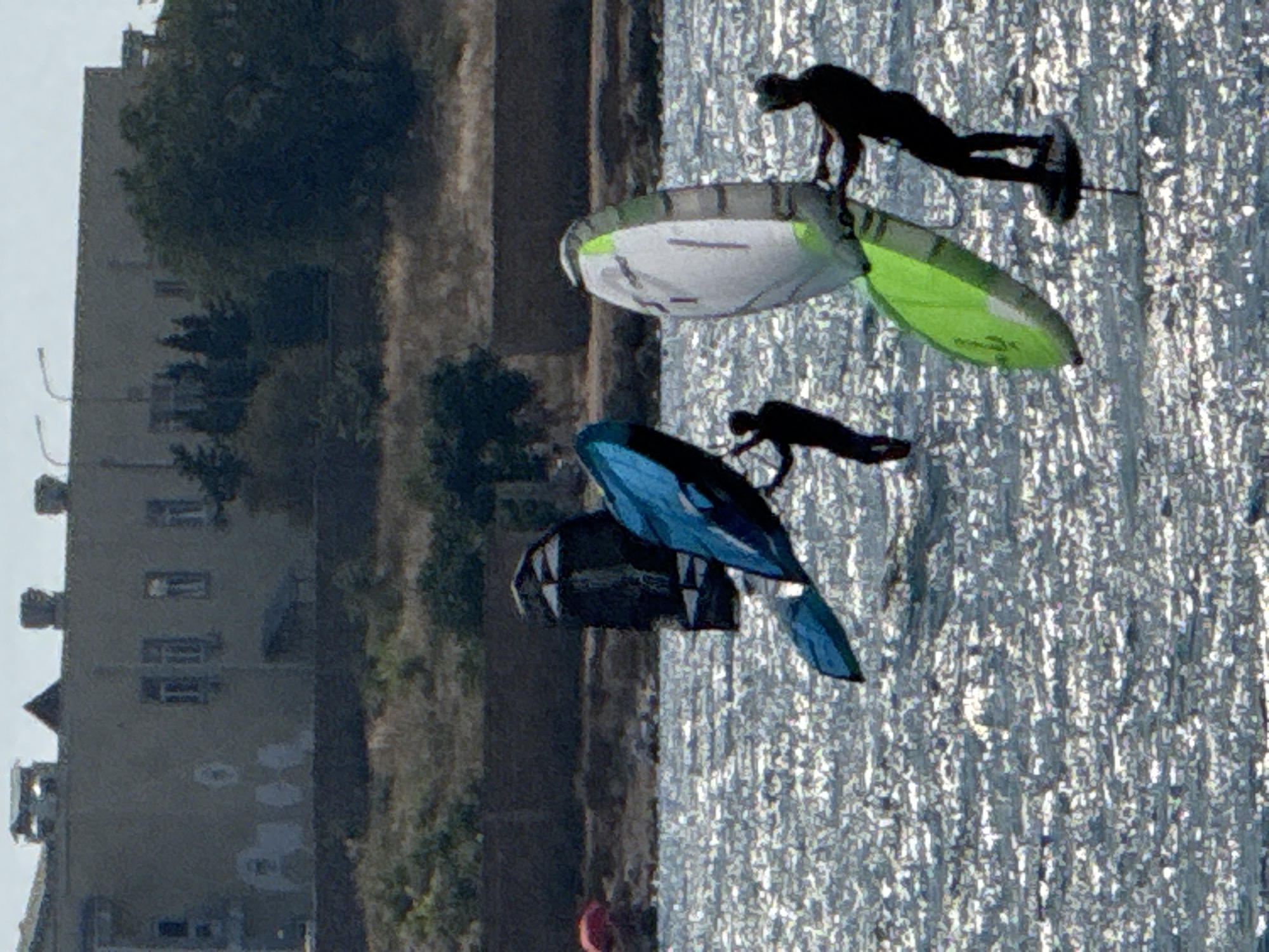 Paddleboats and kite surfers out on Sevastopol's Black Sea coast