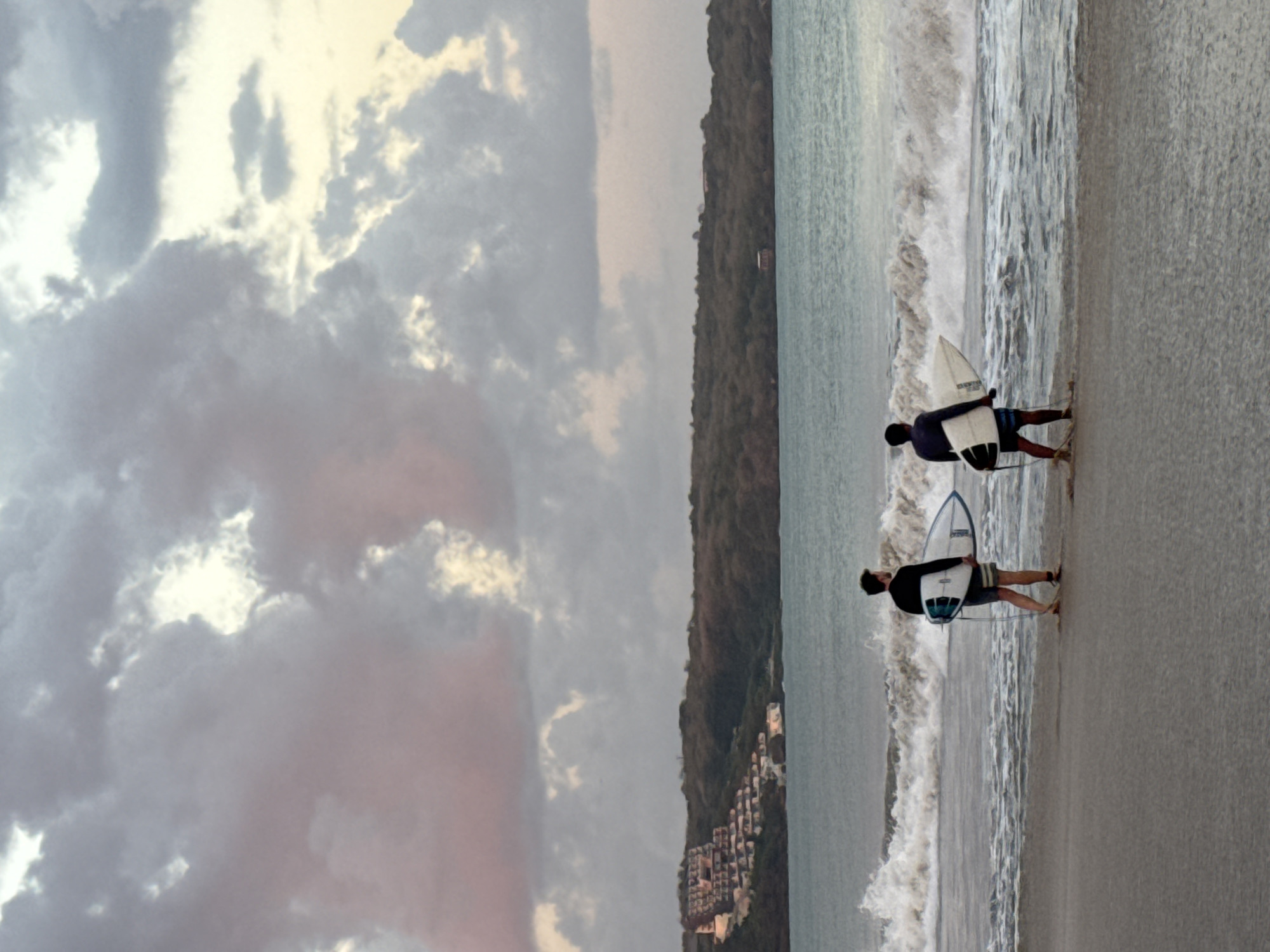 Kuta Beach at sunset — surf, sky, and everyday Bali details