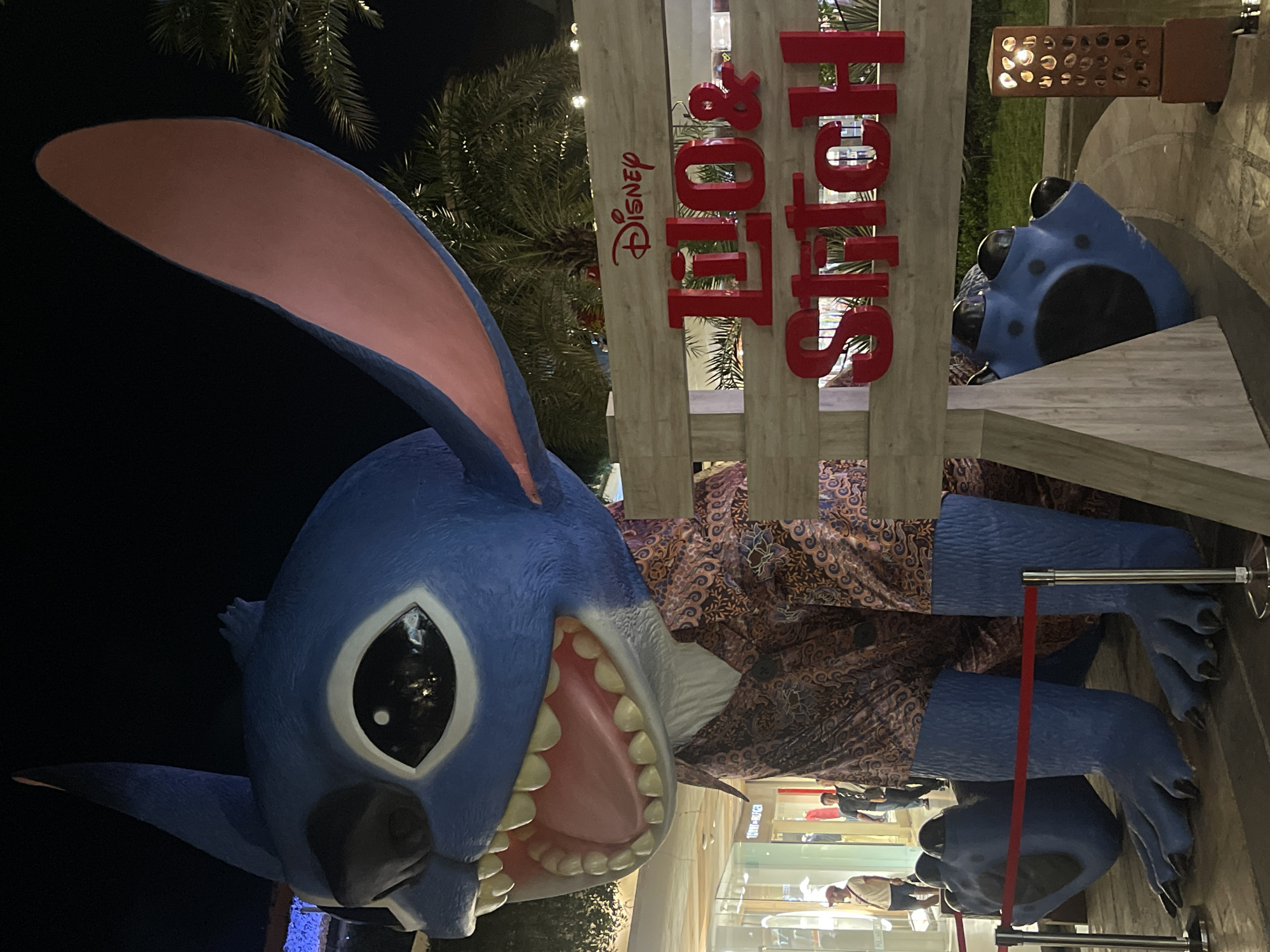 Lilo & Stitch statue lights up Kuta mall at night