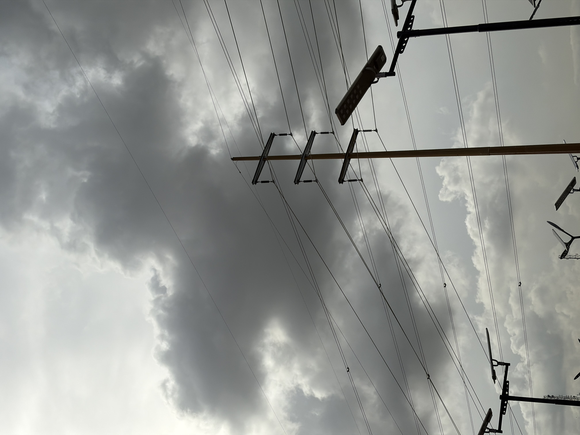 Power lines documented under overcast skies in Igboefon, Nigeria
