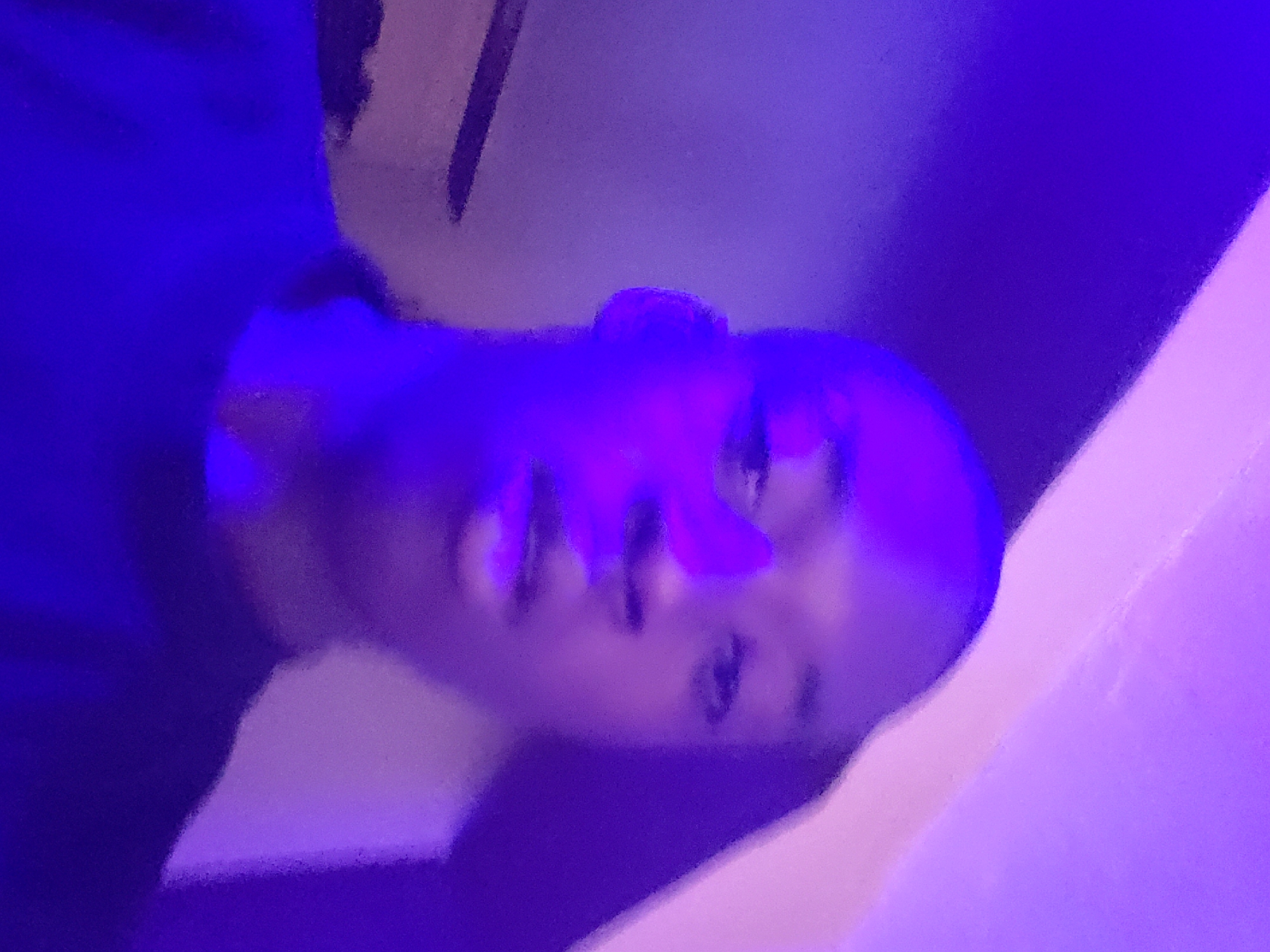 Person illuminated by blue-purple light observed in Nigeria