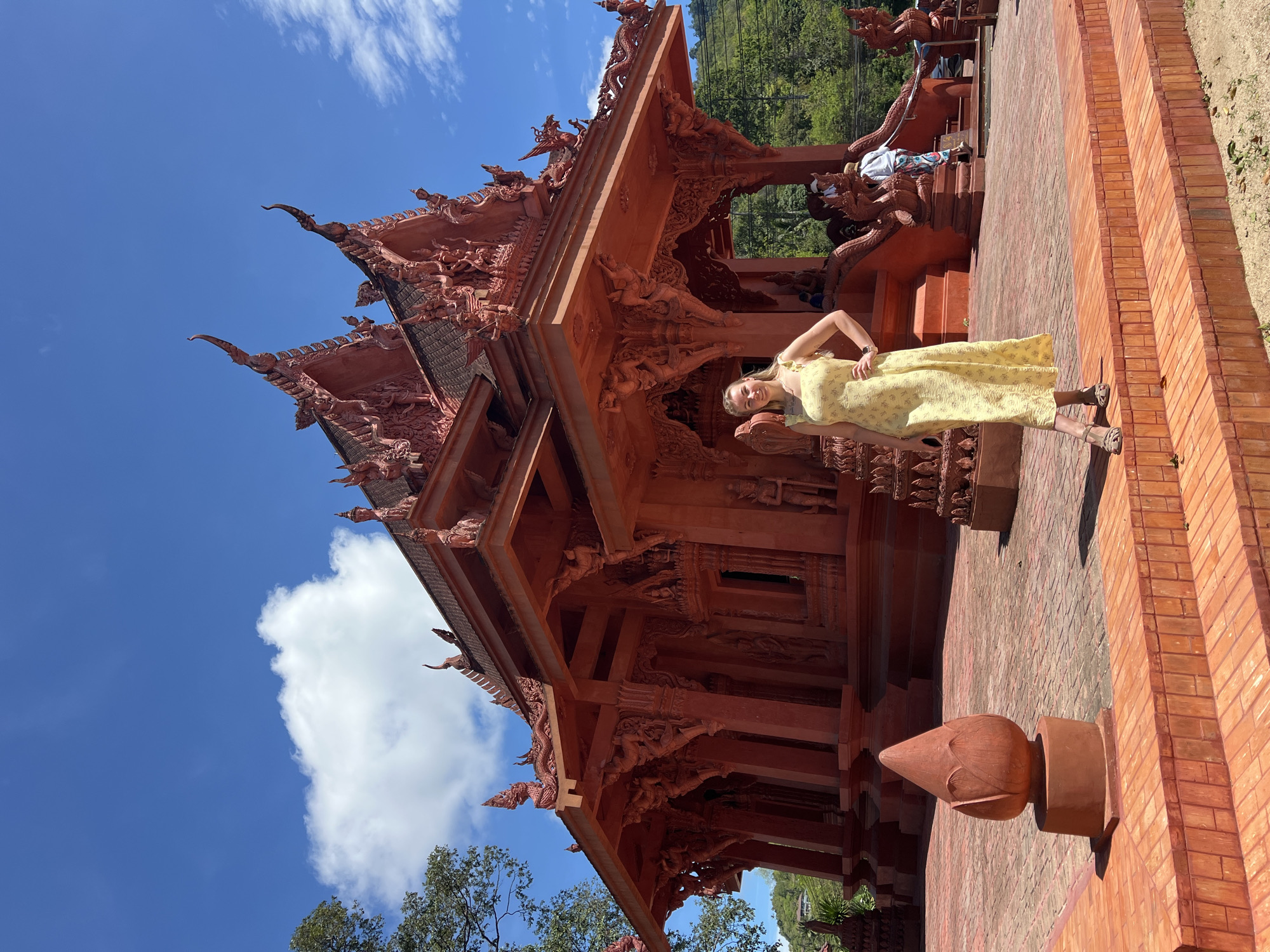 Tourist visits Red Temple, coastal scenes captured in Thailand