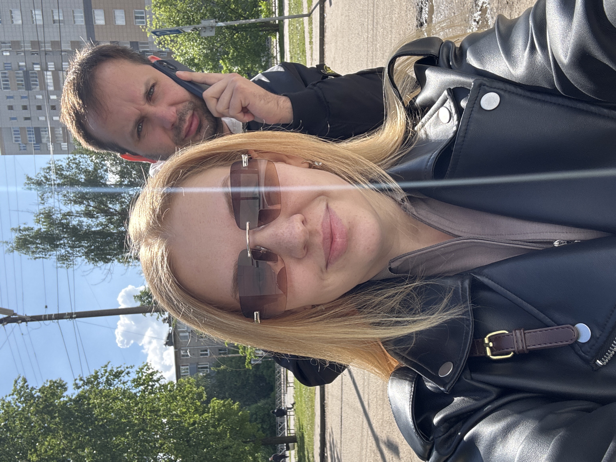 Woman in black jacket documented across multiple Rusanovo locations