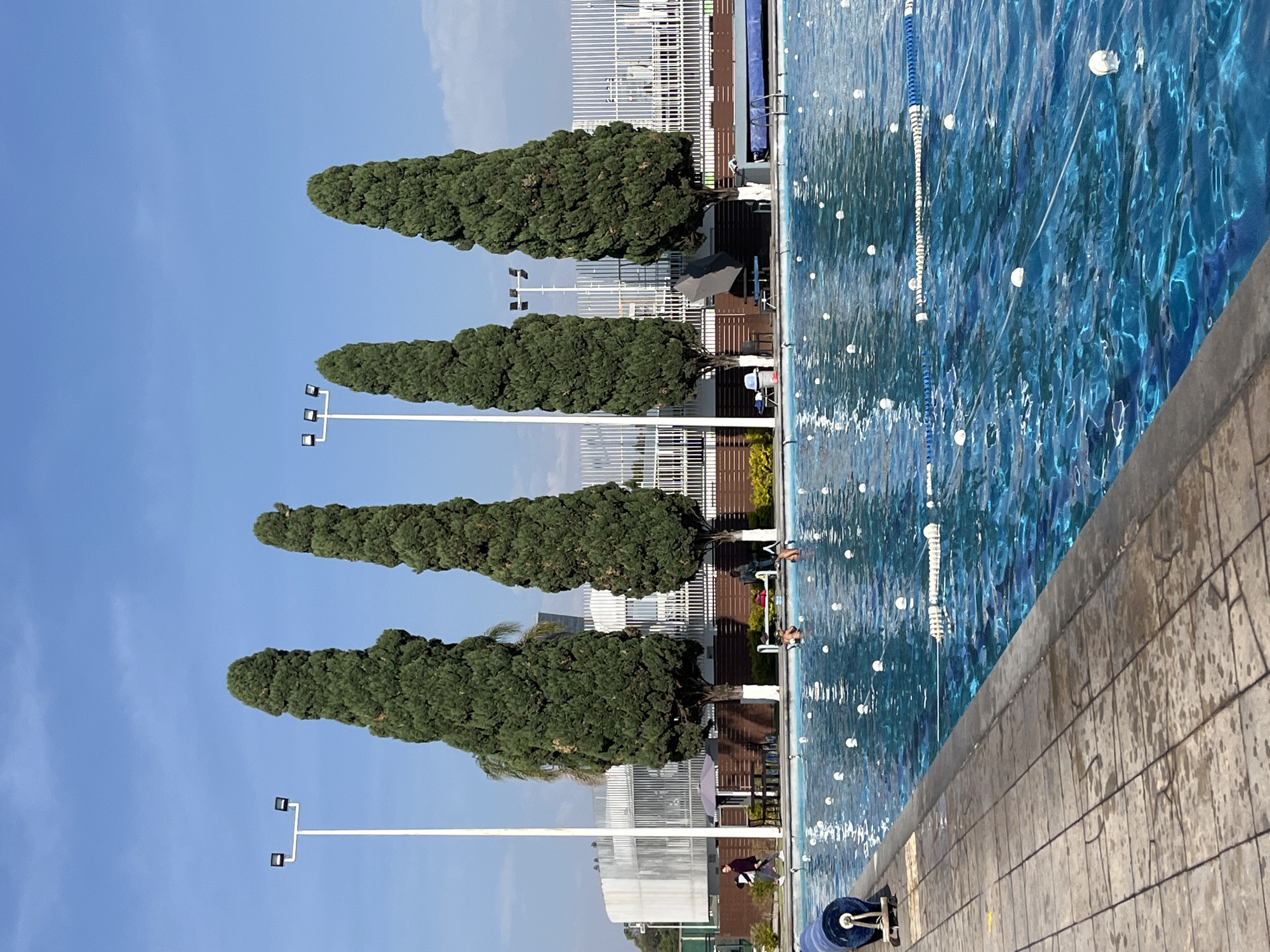 Sunny day recreational facilities documented: pool and soccer field