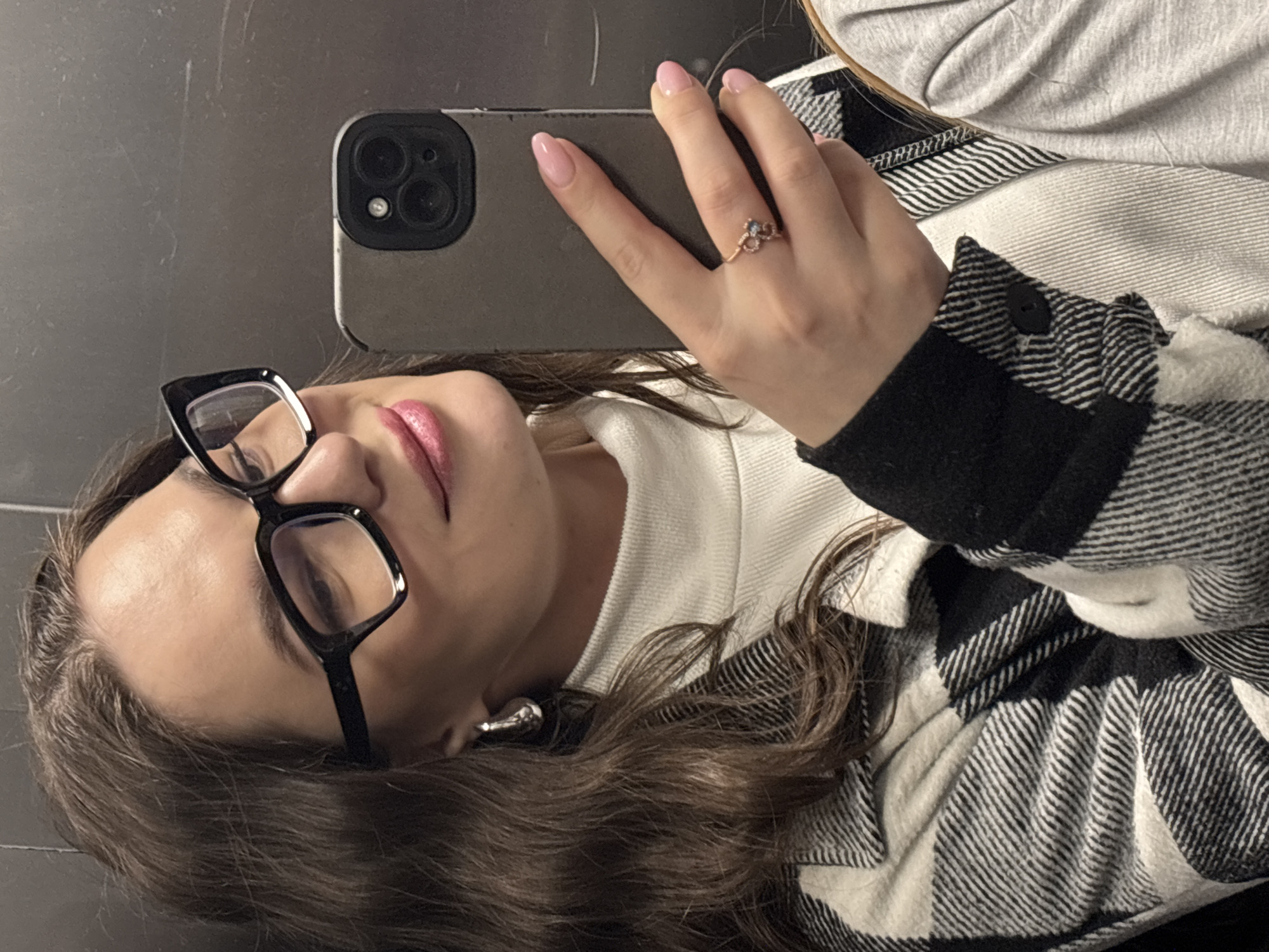 Woman takes selfie at Vnukovo airport terminal