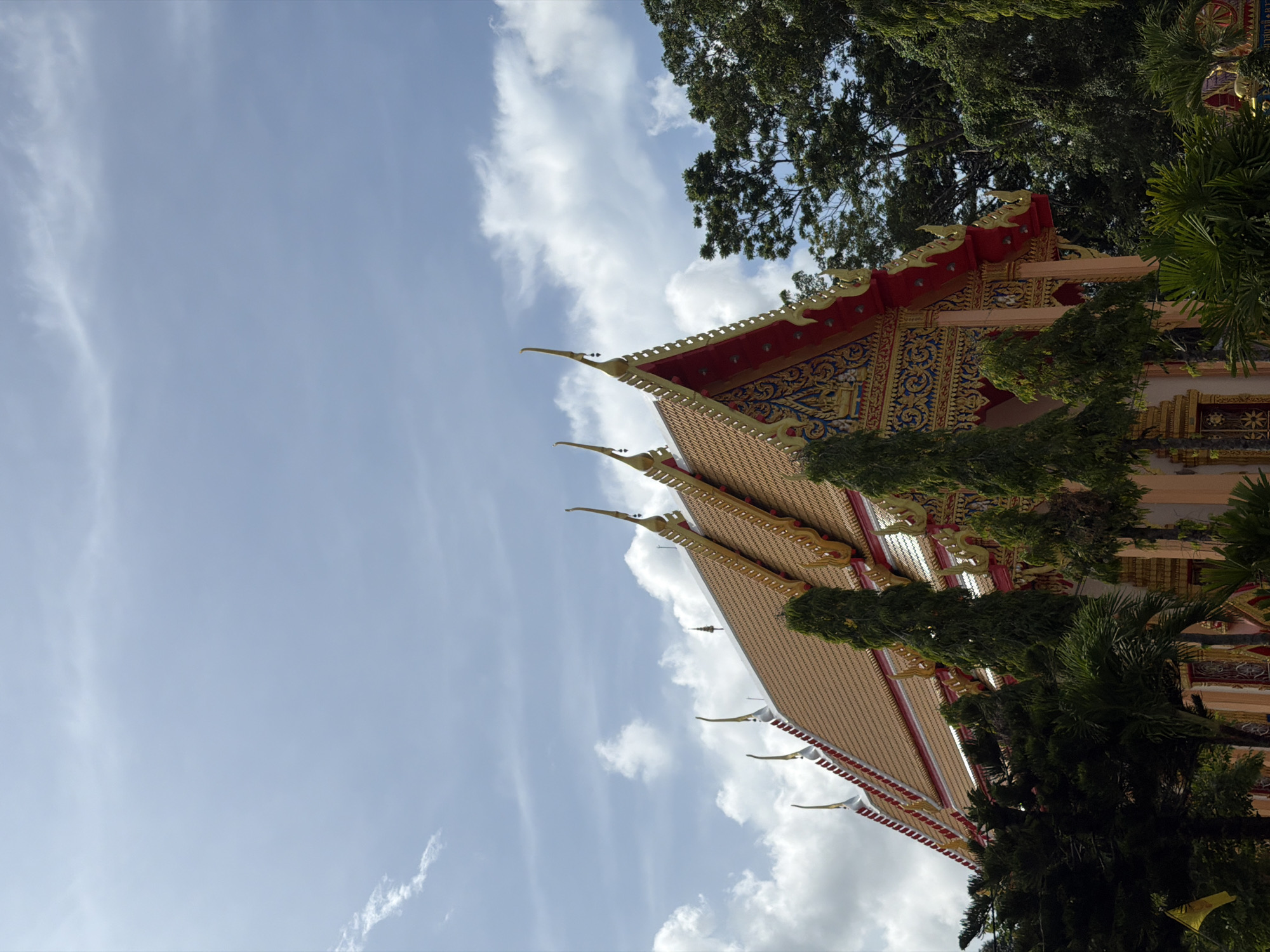 Ornate Buddhist temple explored in Thep Krasatti, Thailand