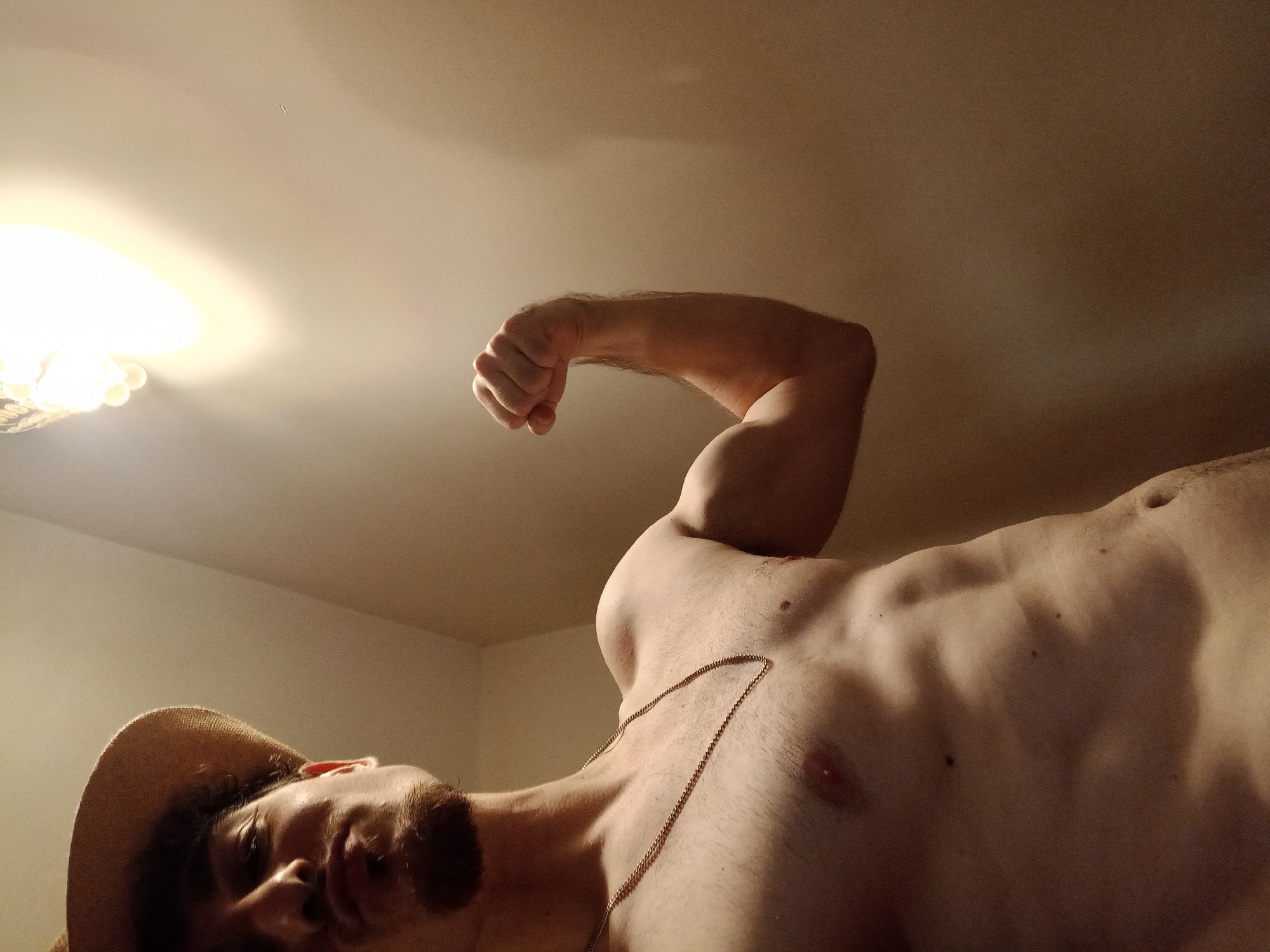Young man takes multiple selfies in Parvomay home