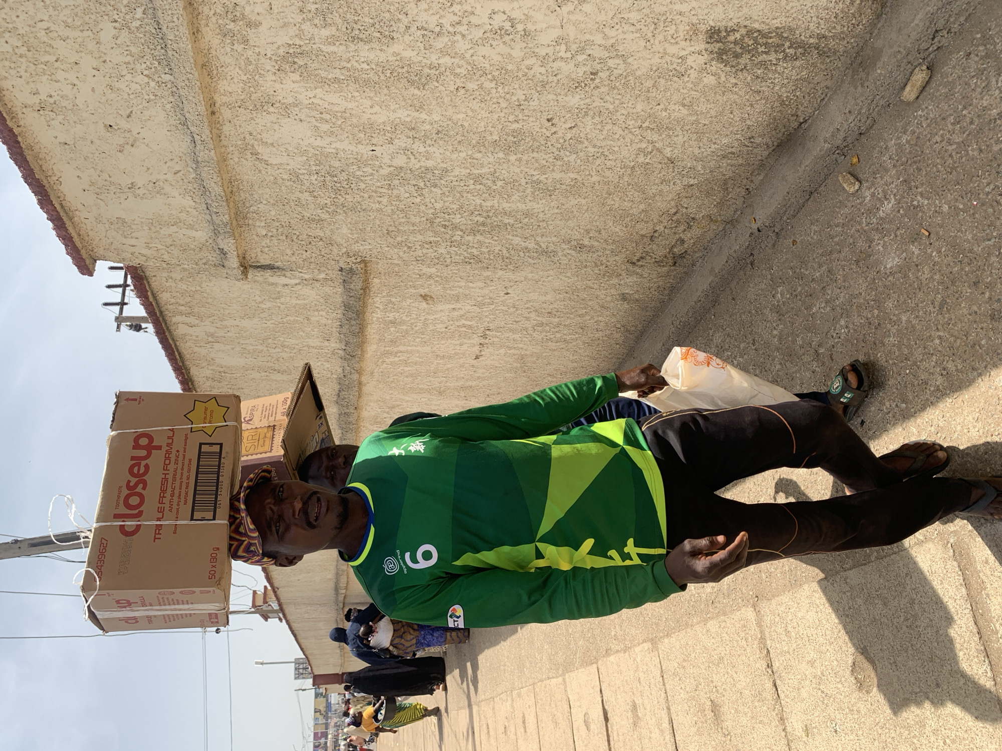 Daily street commerce and community life documented in Jos