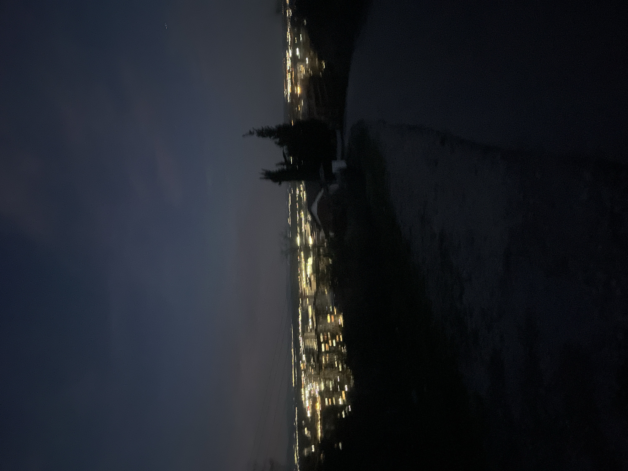 Nighttime cityscape view captured over illuminated Asenovgrad, Bulgaria