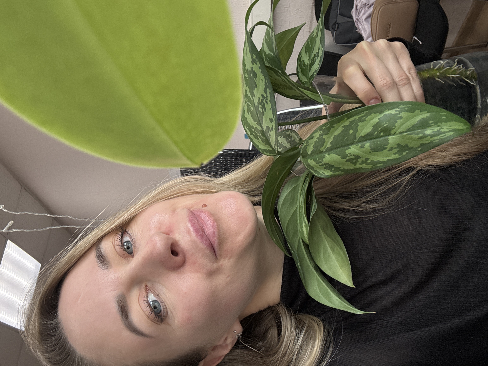 Woman photographed in multiple indoor settings in Chaikovsky