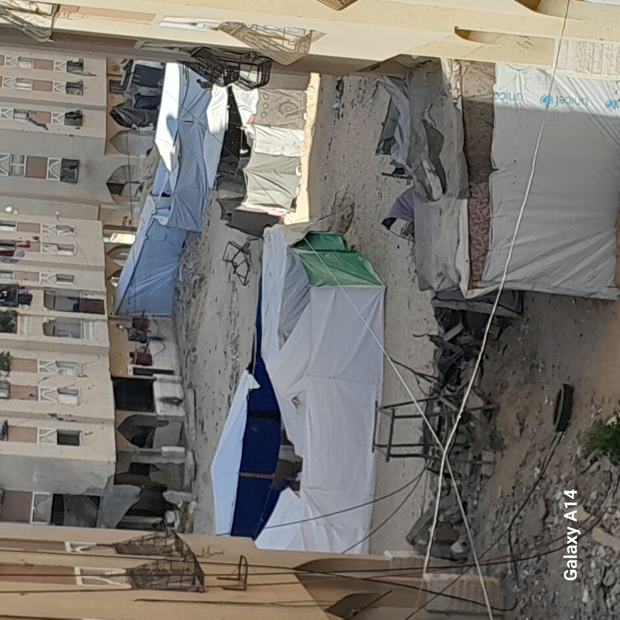 Damage aftermath and temporary shelters in Khan Yunis