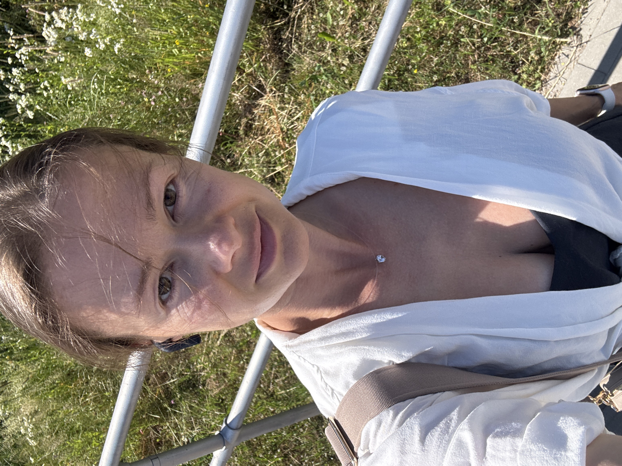 Casual outdoor selfie in Riga on a summer afternoon.