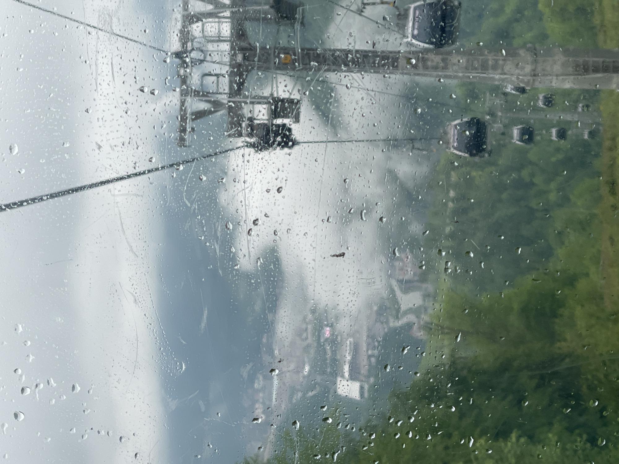 Gondola rider documents rainy foggy conditions in Estosadok