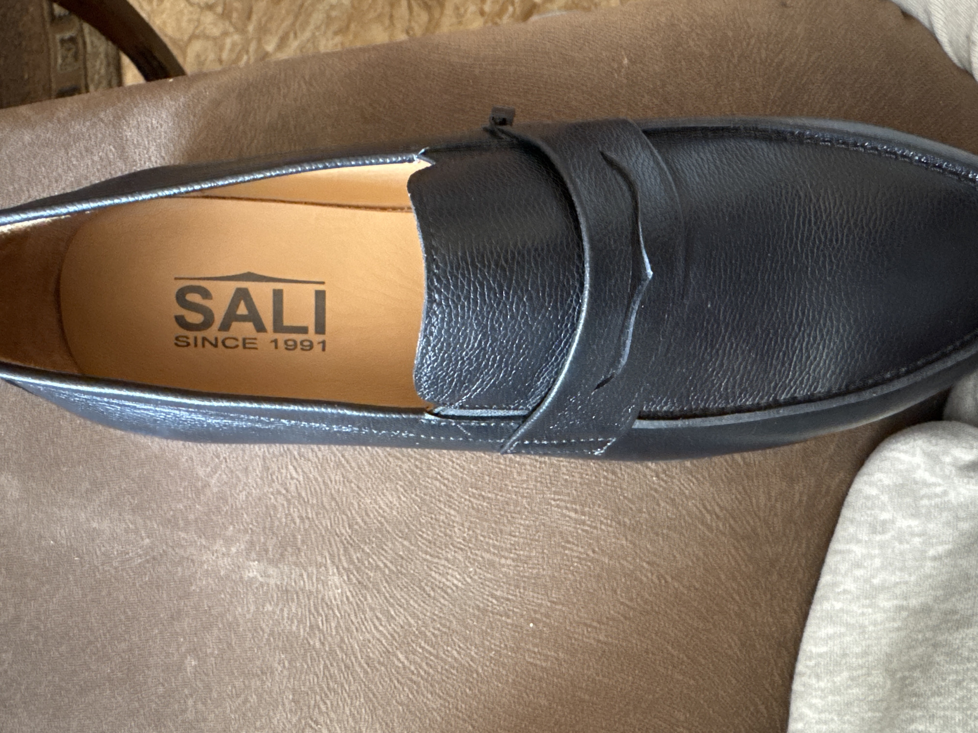 Casual indoor moments documented in Yerevan: shoe, video game