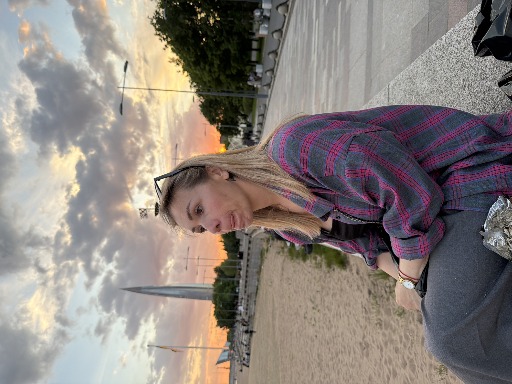 Woman photographed in contemplative moments during sunset in Saint Petersburg