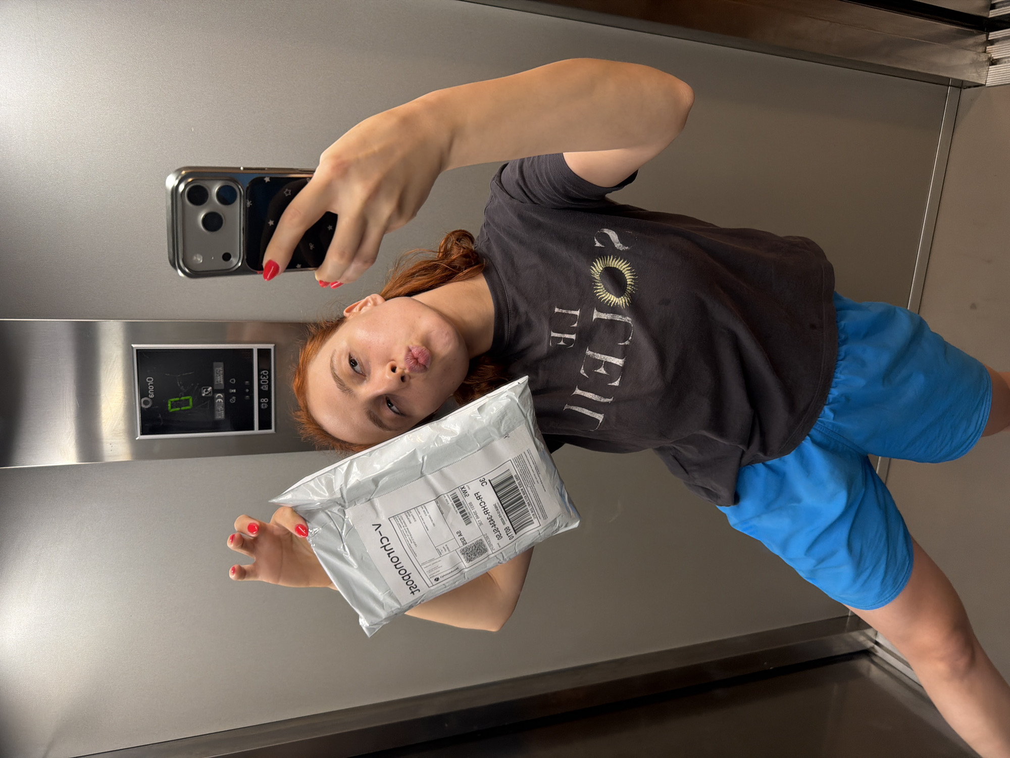 Elevator selfies and a street glimpse in Strasbourg