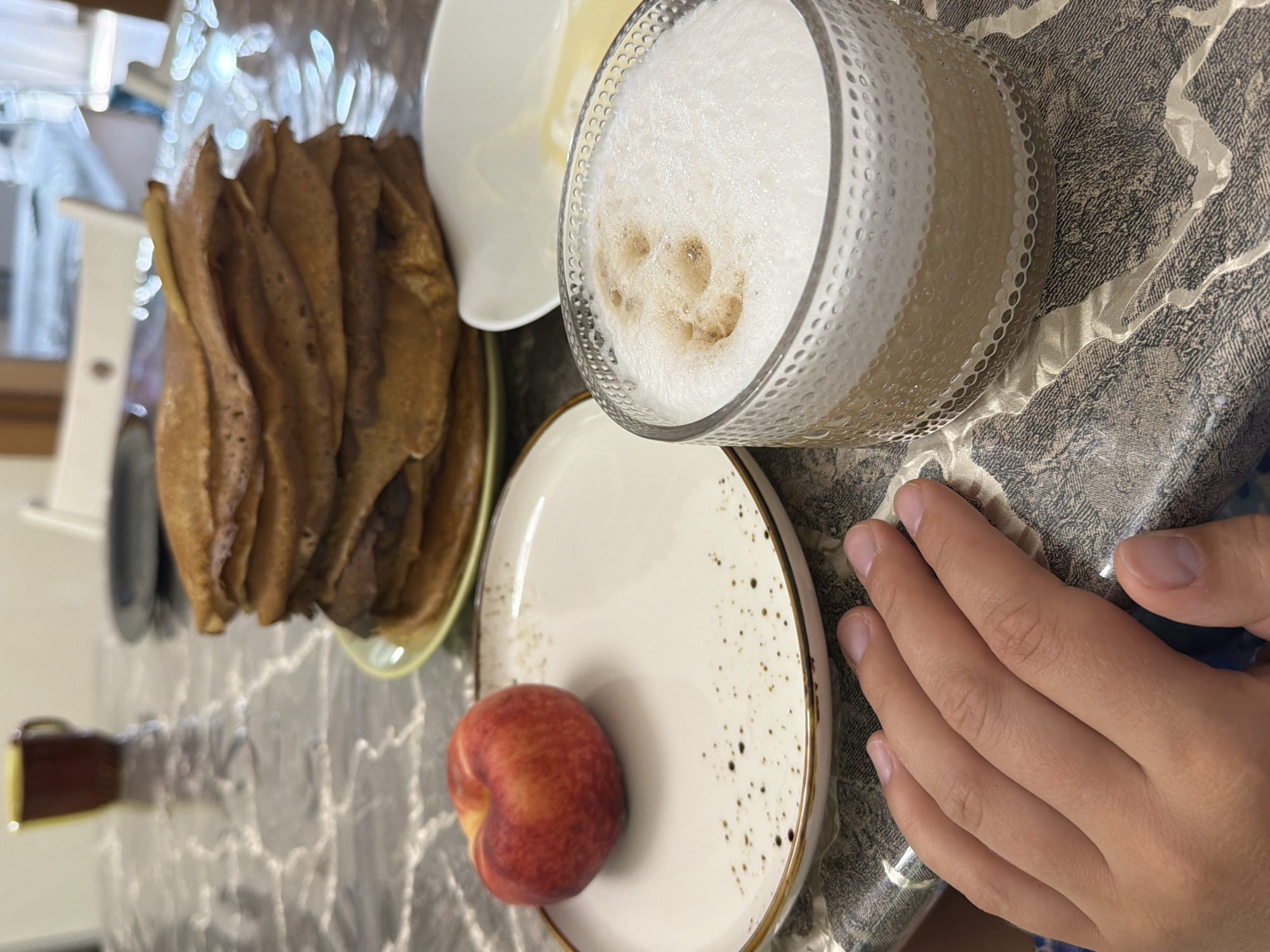 Quiet domestic morning in Sochi with breakfast, a cat, and family