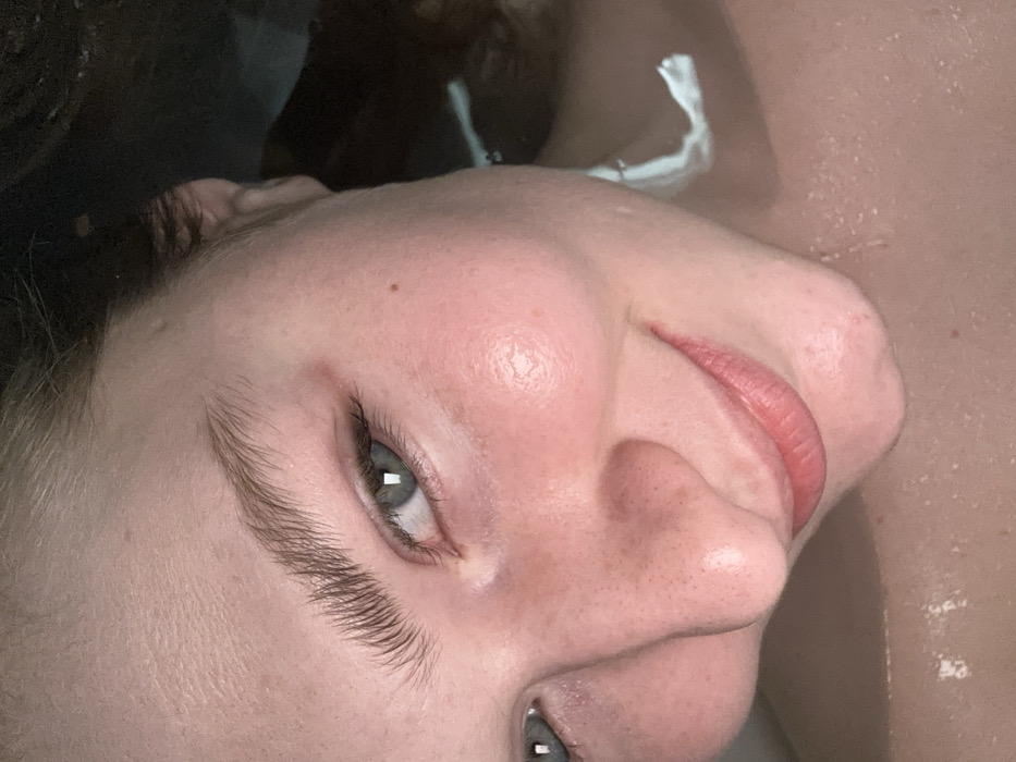 Woman documents personal care routine in Kazan bathroom