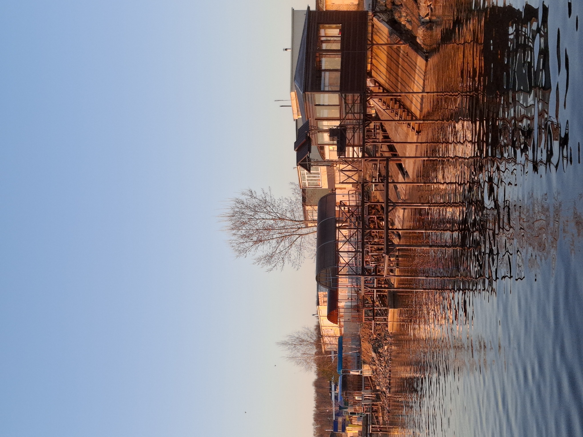 Sunset moments captured along Kama River waterfront in Chaikovsky