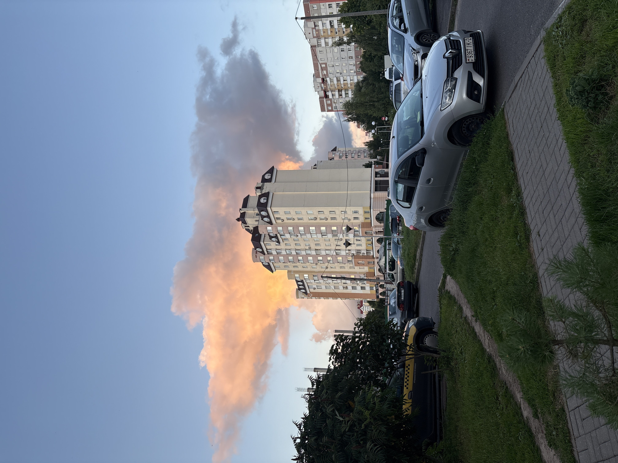 Vitsebsk residential blocks at dusk, construction nearby
