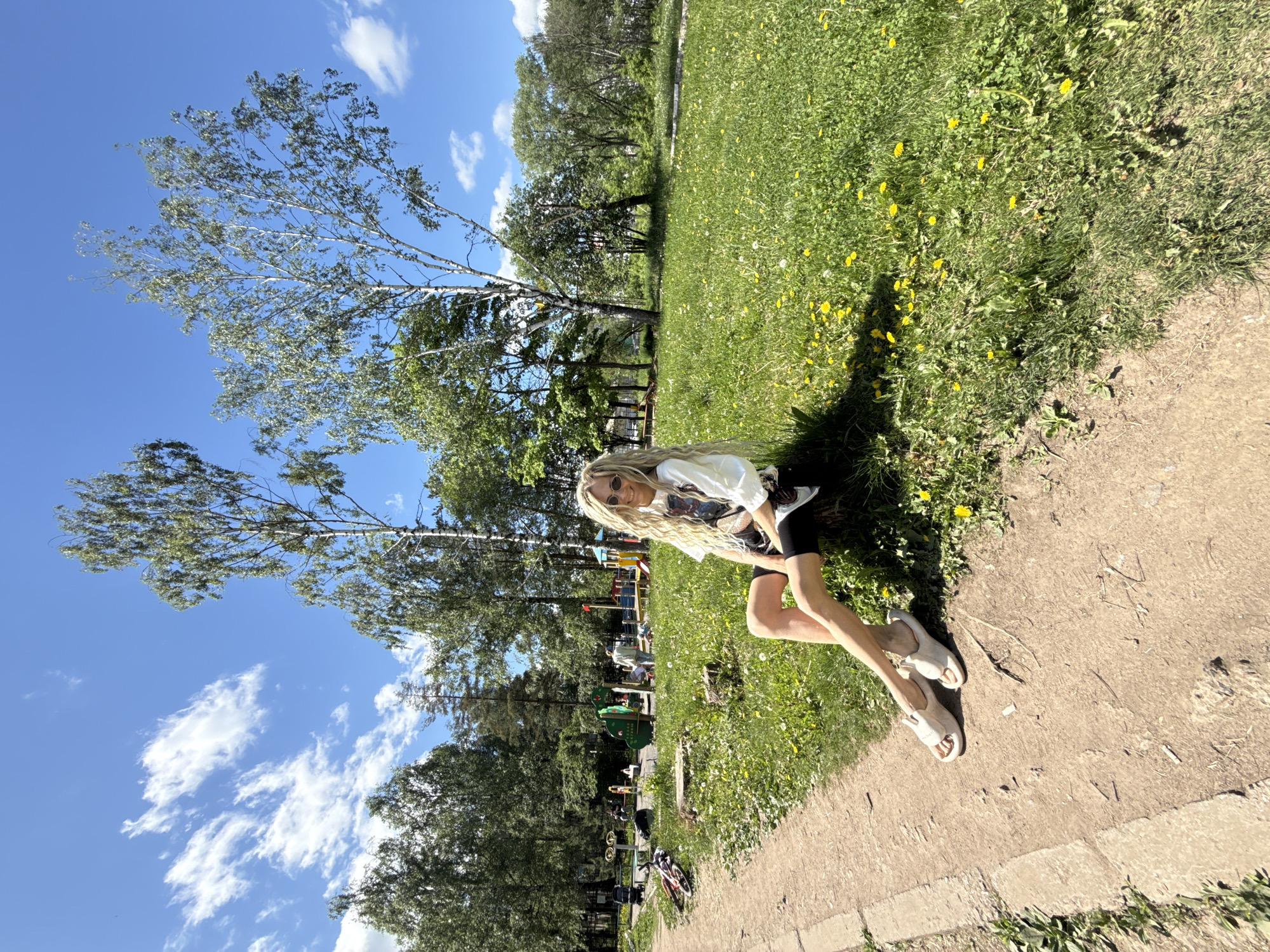 Woman enjoys morning park visit in Rusanovo, Russia