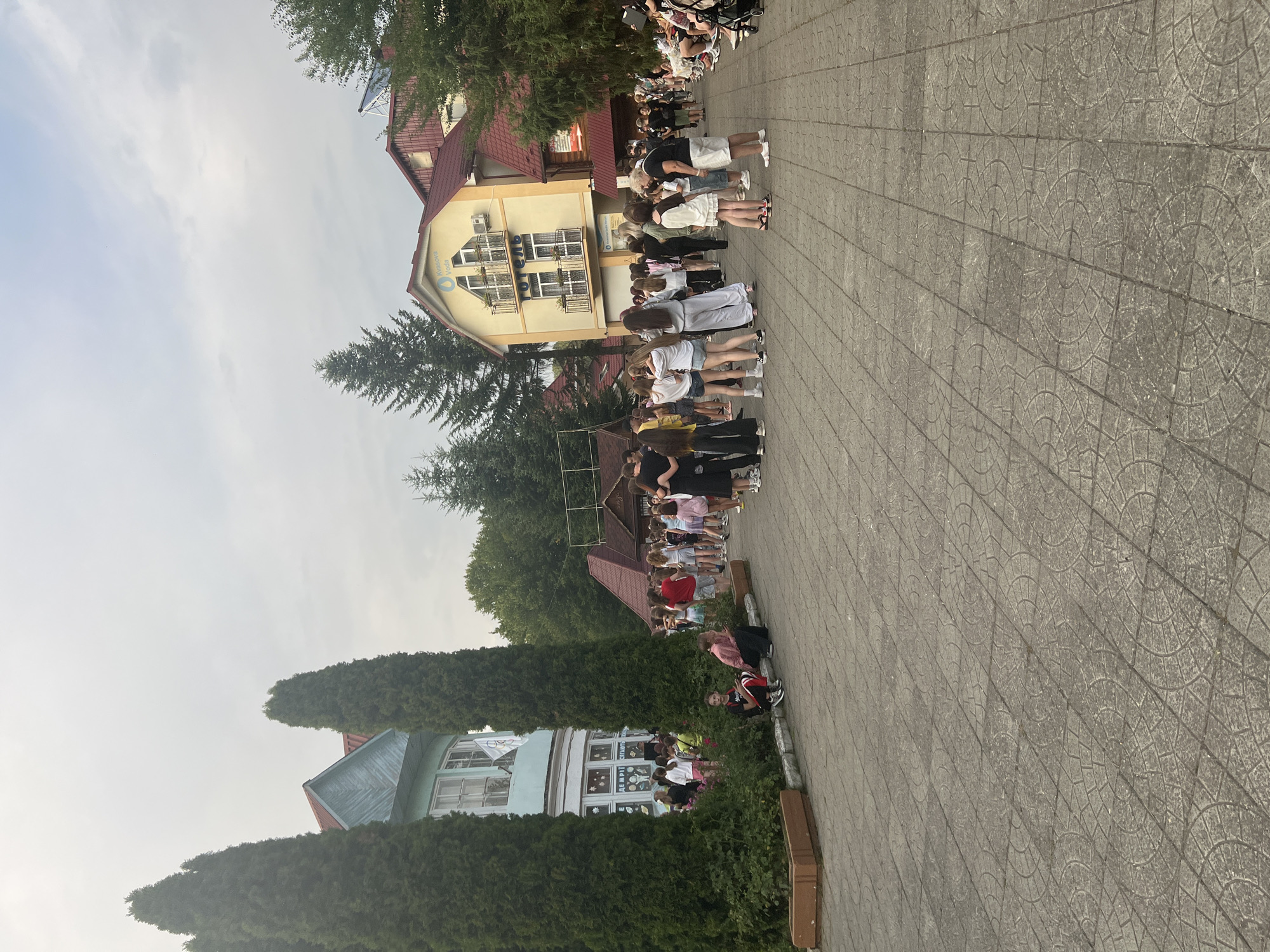 Outdoor gathering with dancing at a resort-style venue in Сонячне