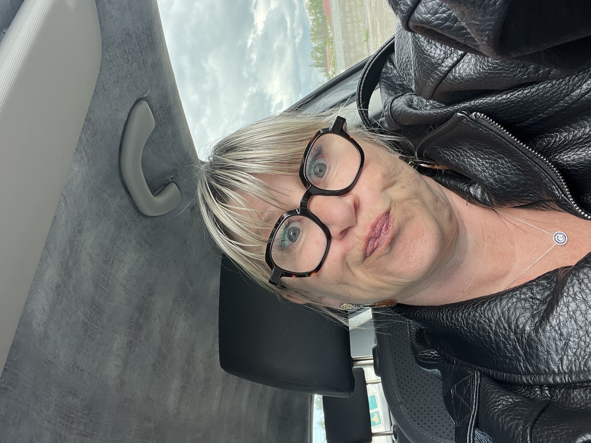 Woman Takes Selfie in Car in Saint-Cyprien