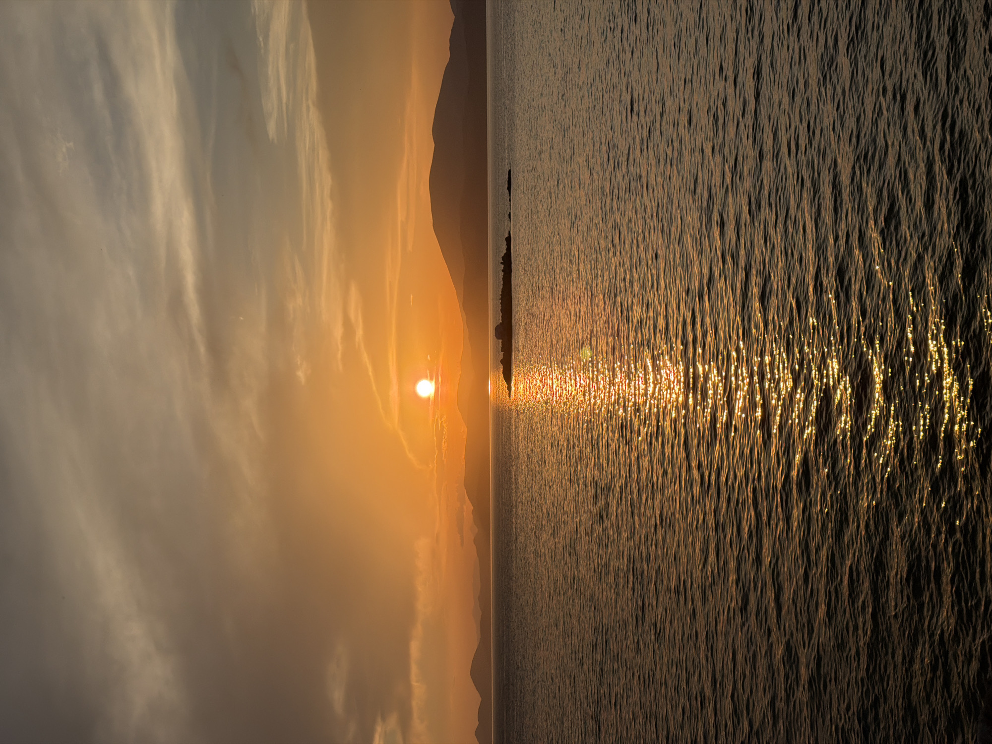 Sunset scenes captured across Hydra harbor and coastline